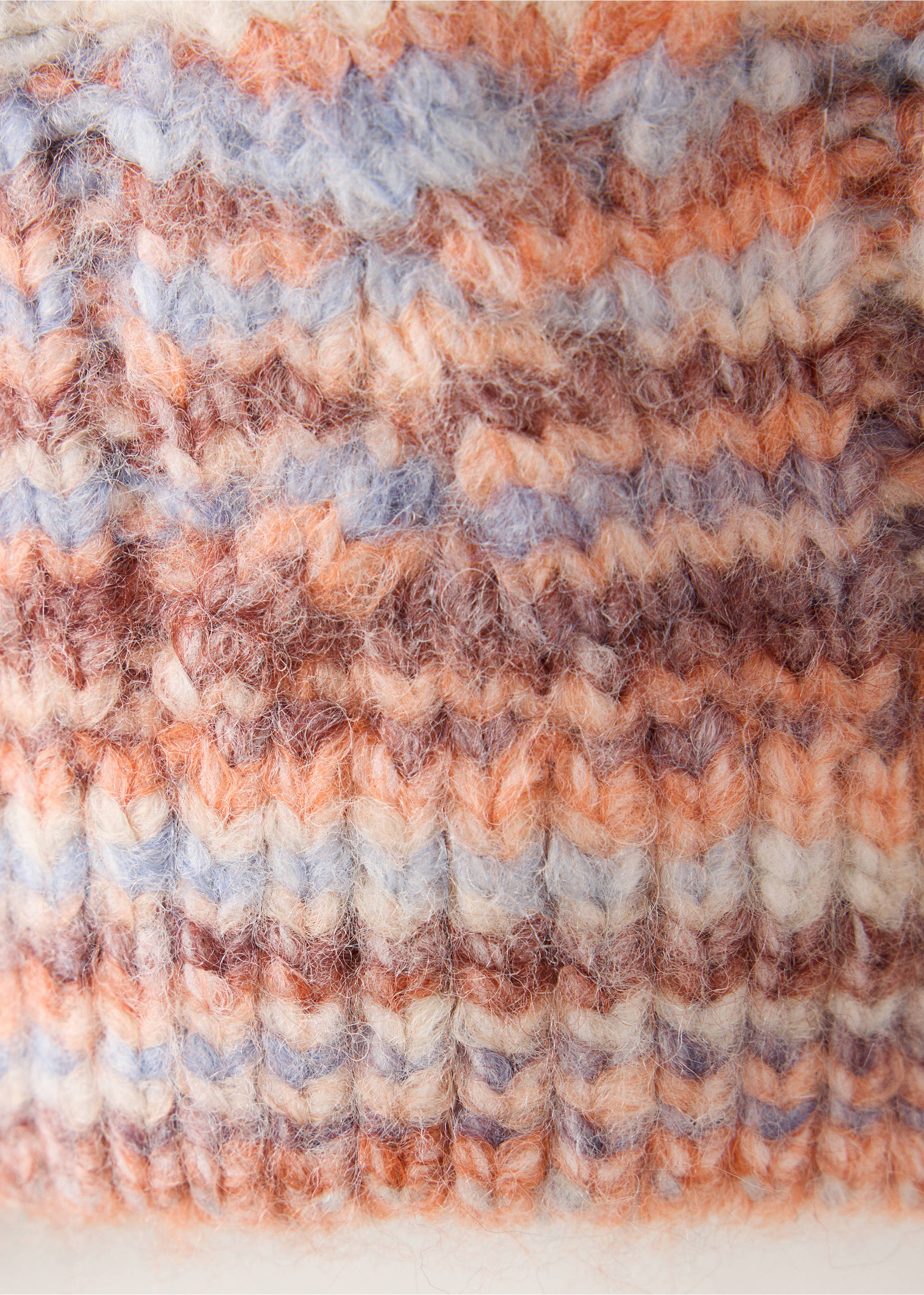 Close-up of a fuzzy knit sweater with multi-coloured stripes., Pastel Orange. Ref: 37058277-00.