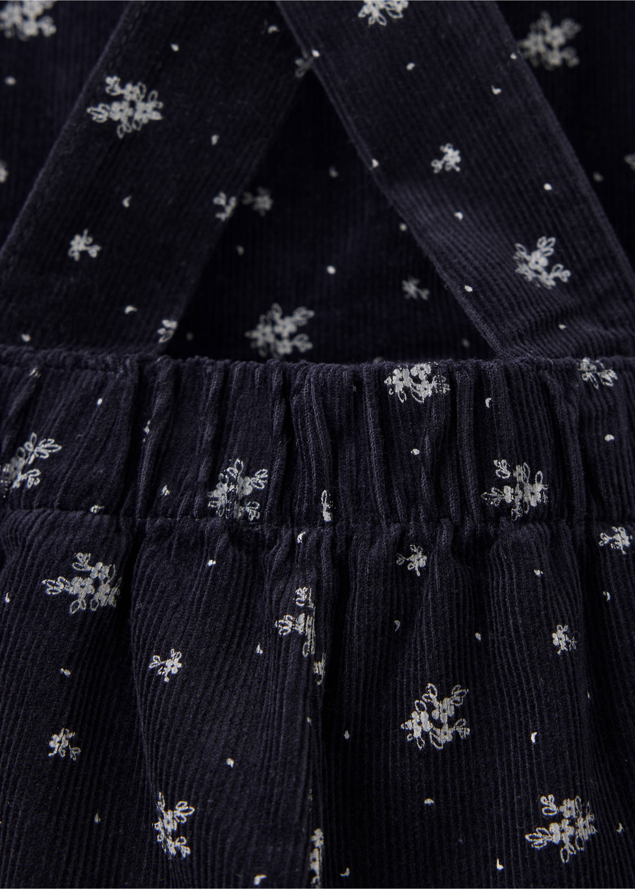 Dark blue floral print corduroy overalls fabric detail., Navy. Ref: 37058284-00.
