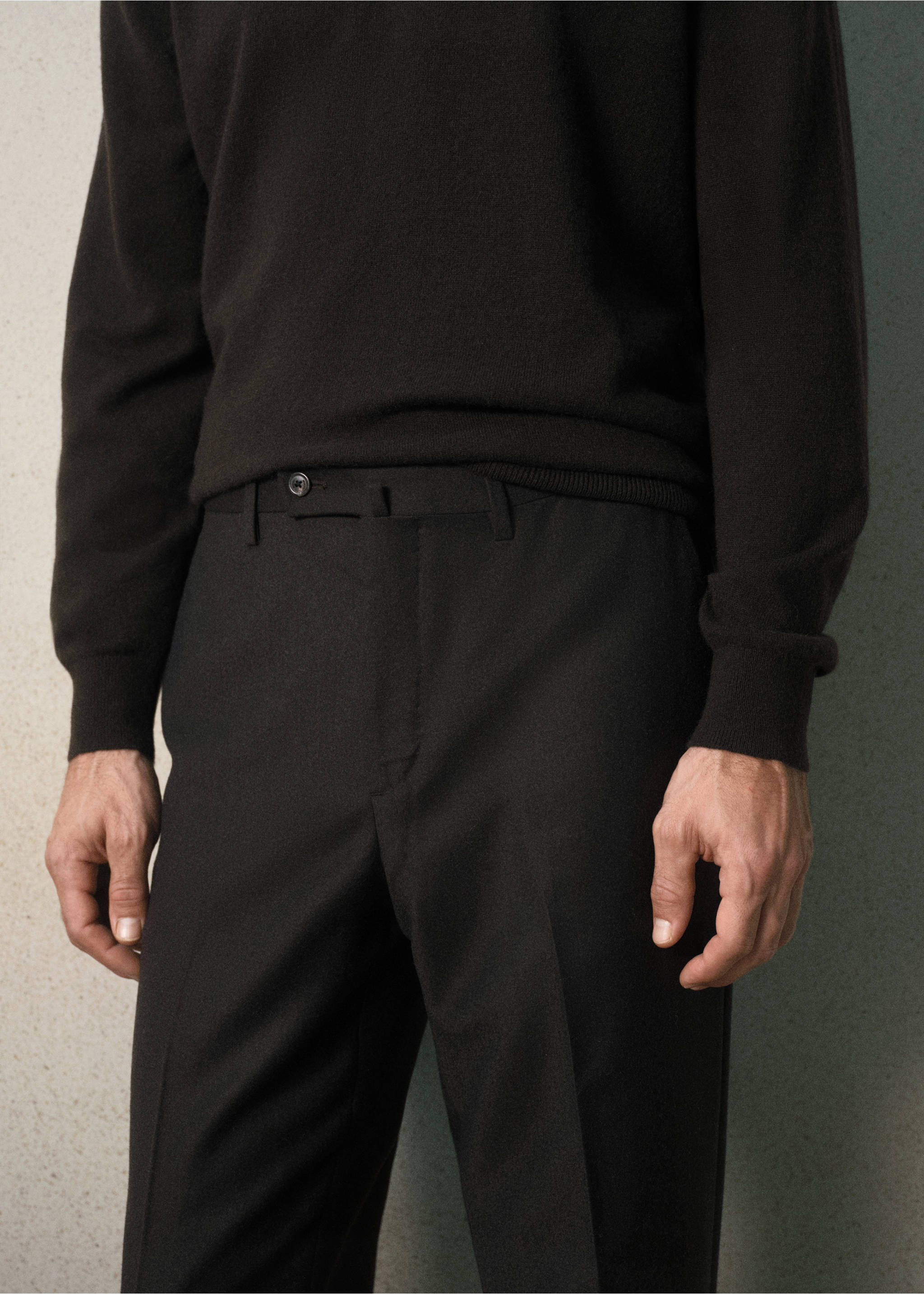 Close-up of black trousers with a button fastening and belt loops., Brown. Ref: 37058630-00.