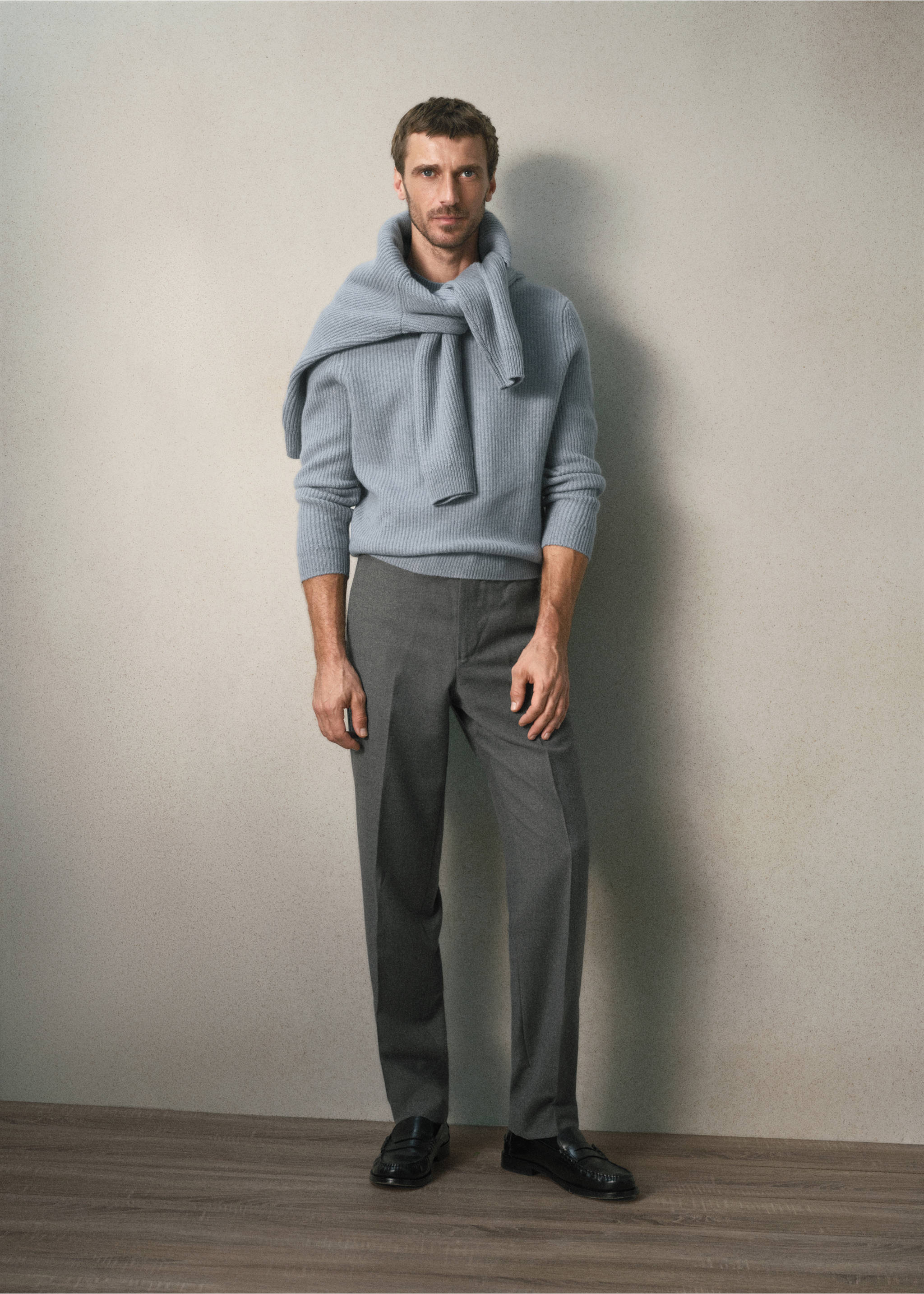Grey trousers with straight legs and pressed creases, worn with a light blue sweater., Light Heather Grey. Ref: 37058630-00.