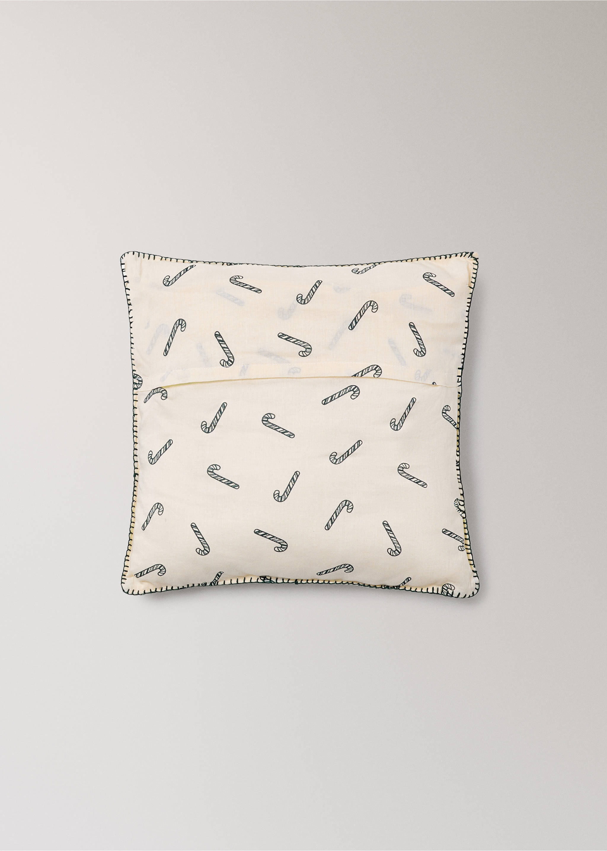 Off-white cushion with a candy cane print and dark stitched edge., Red. Ref: 37058635-00.