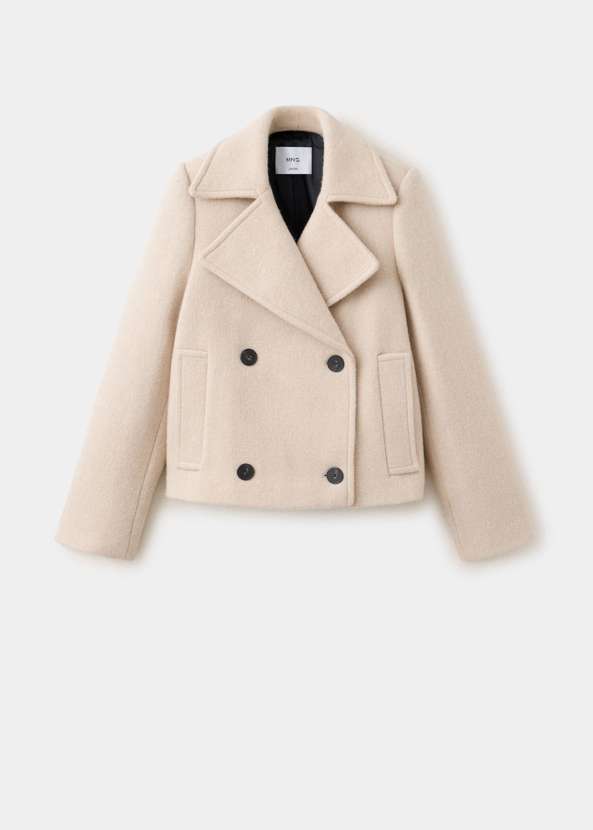 Beige double-breasted cropped jacket with lapels and dark buttons.