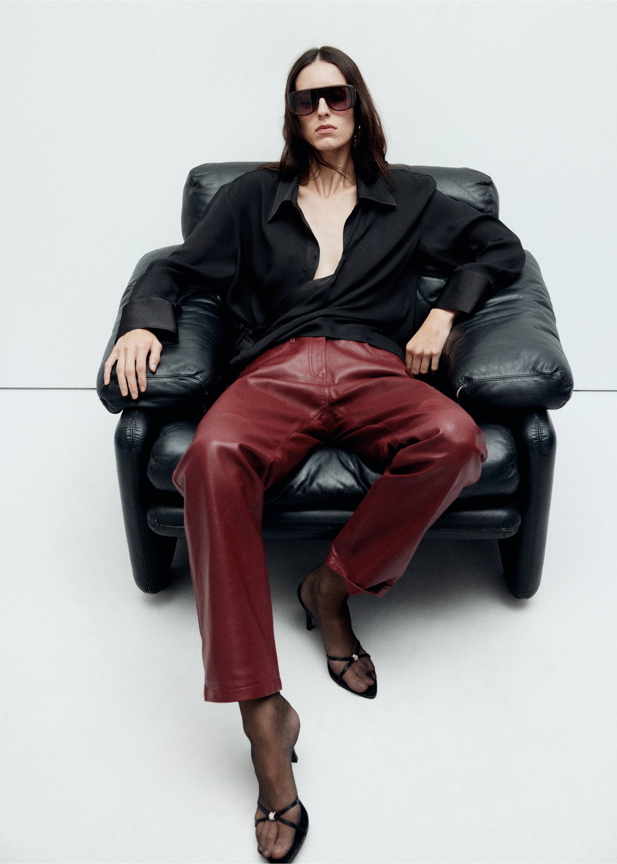 Black relaxed-fit shirt with a collar, worn with dark red trousers., Black. Ref: 37059129-00.