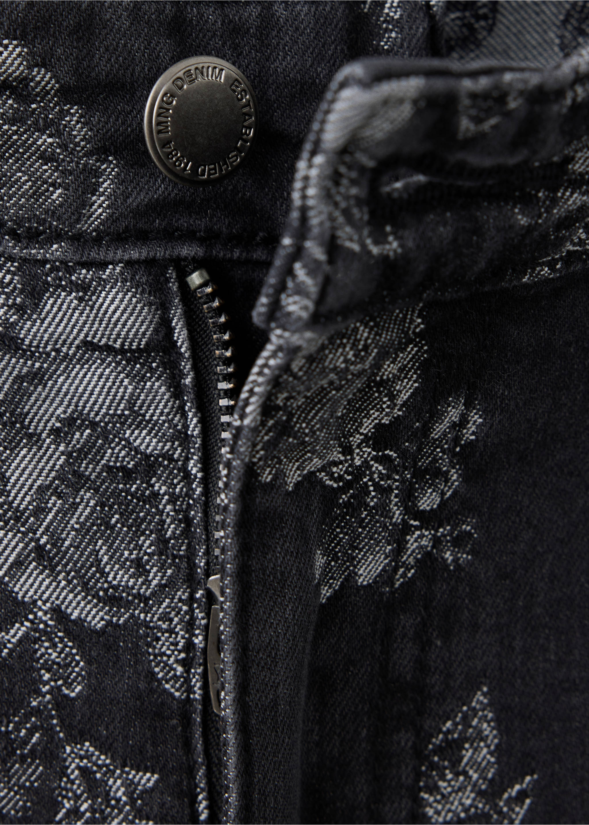 Dark grey floral print denim trousers waistband and button close-up view., Denim Grey. Ref: 37059134-00.