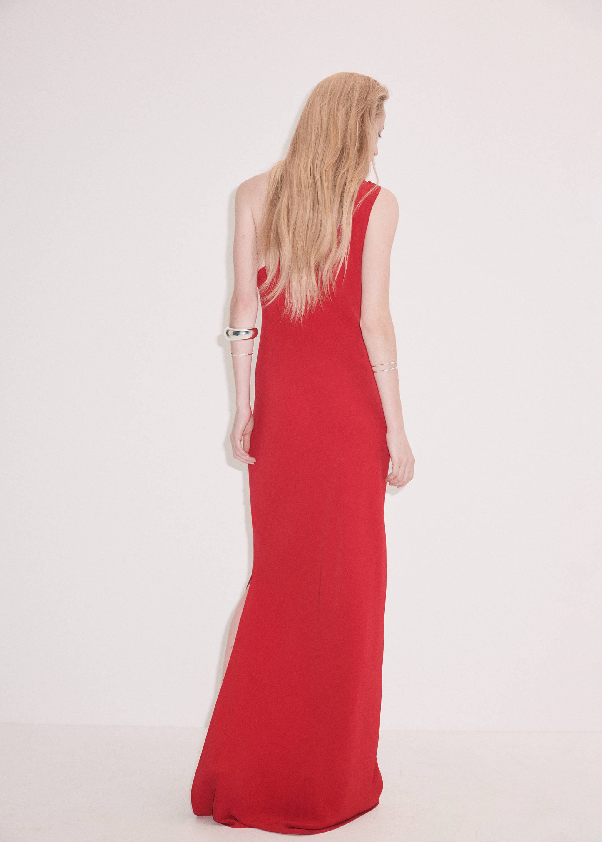 Red one-shoulder maxi dress, back view.