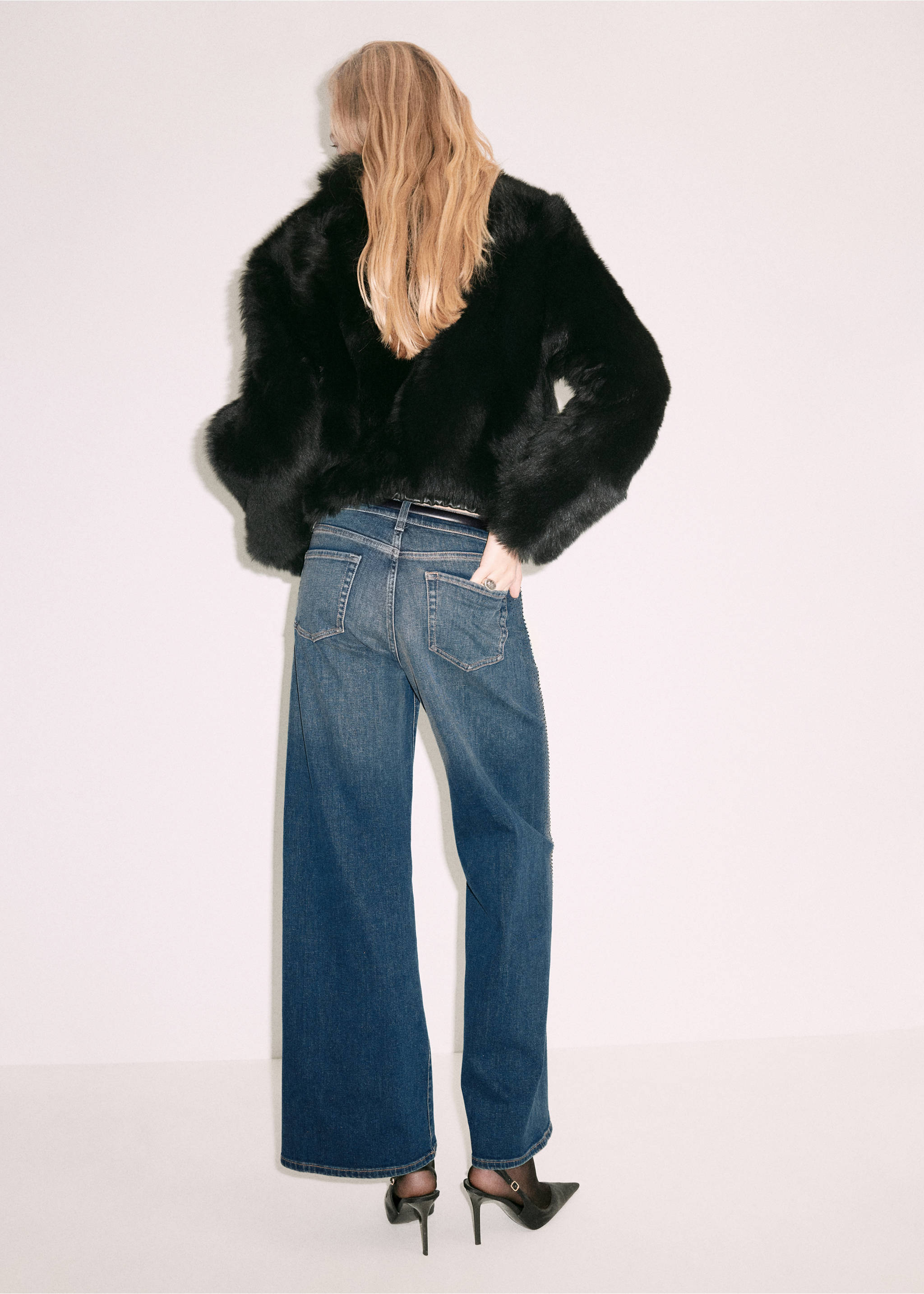 Blue wide-leg denim trousers, back view., Dark Blue. Ref: 37059144-00.