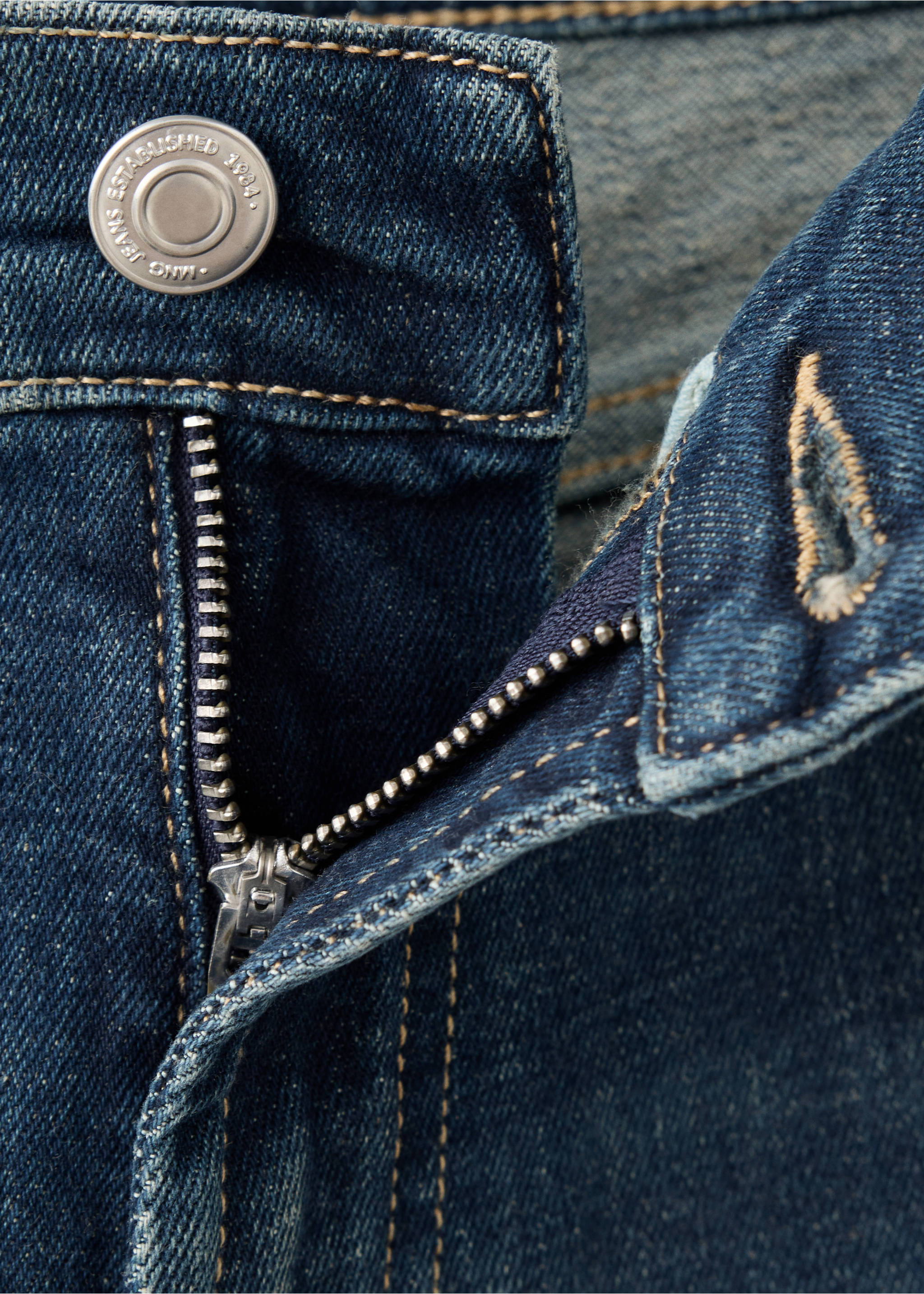 Close-up of blue denim jeans waistband and zip fly., Dark Blue. Ref: 37059144-00.