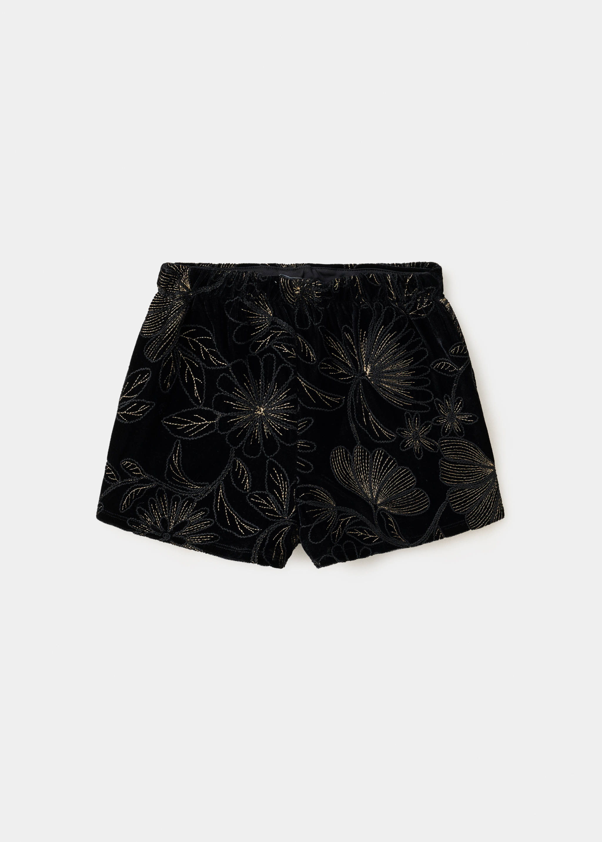 Black velvet shorts with gold floral embroidery, back view.