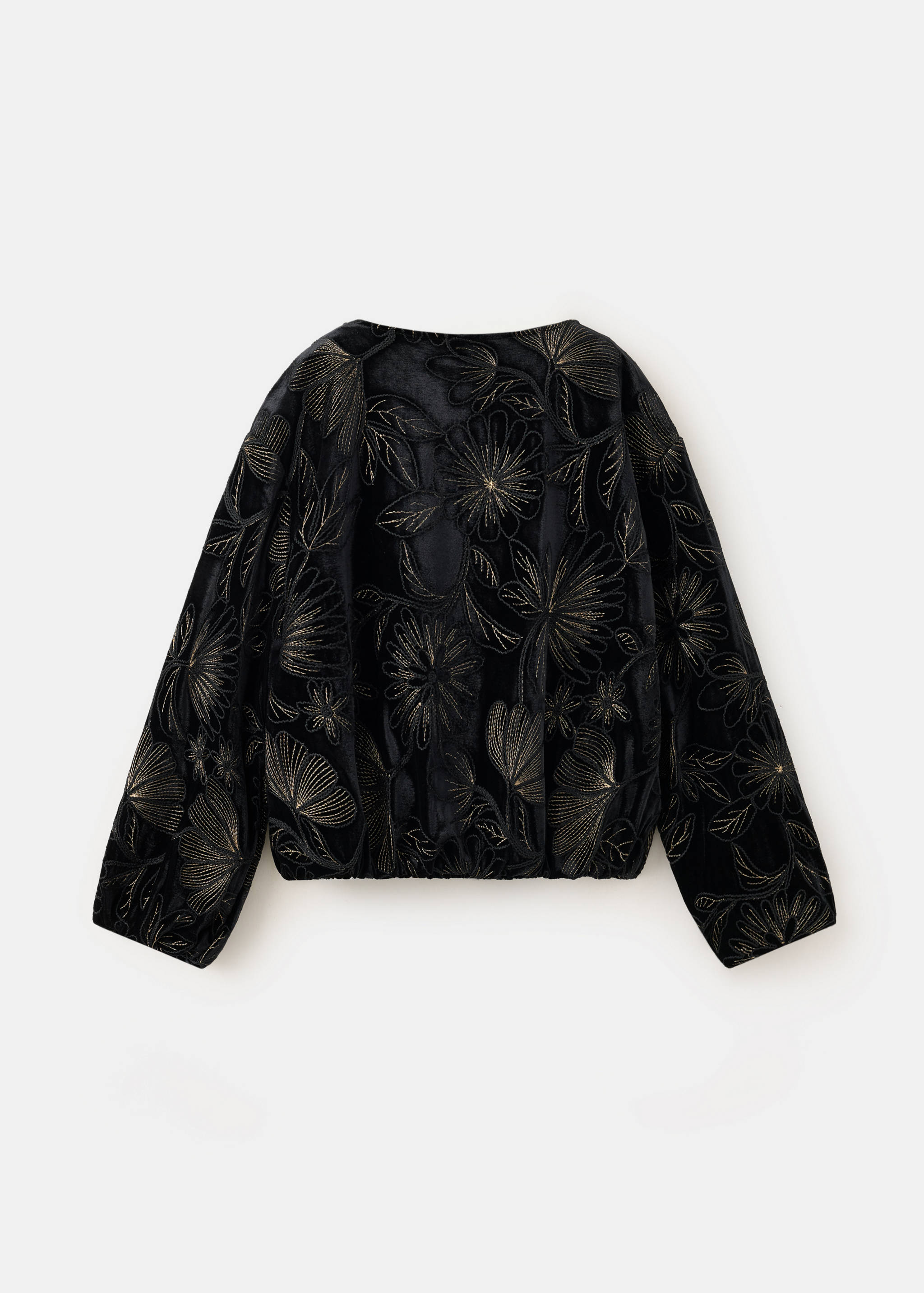 Back view of a black jacket with gold floral embroidery and an elasticated hem.
