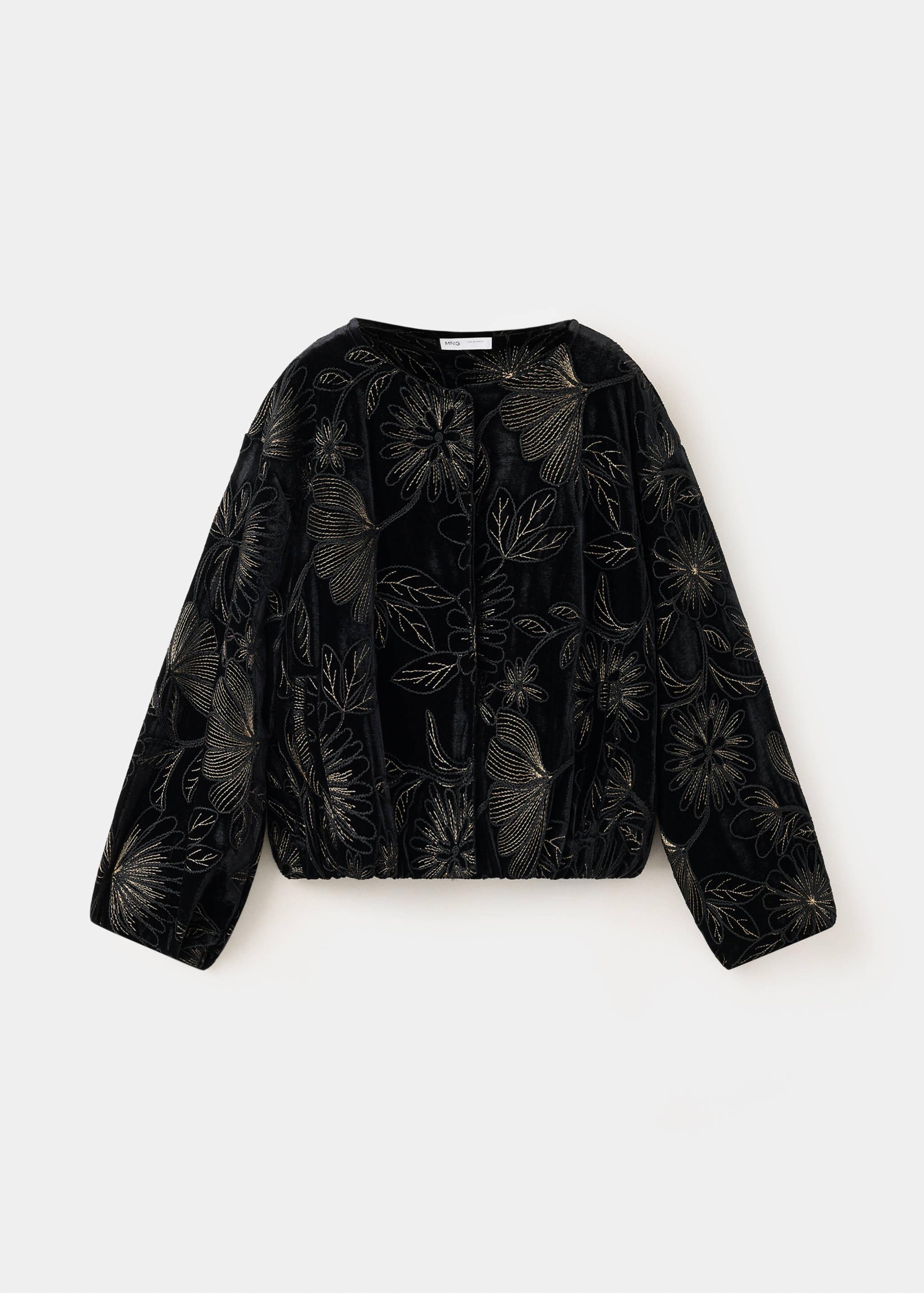 Black velvet jacket with gold floral embroidery and elastic hem.