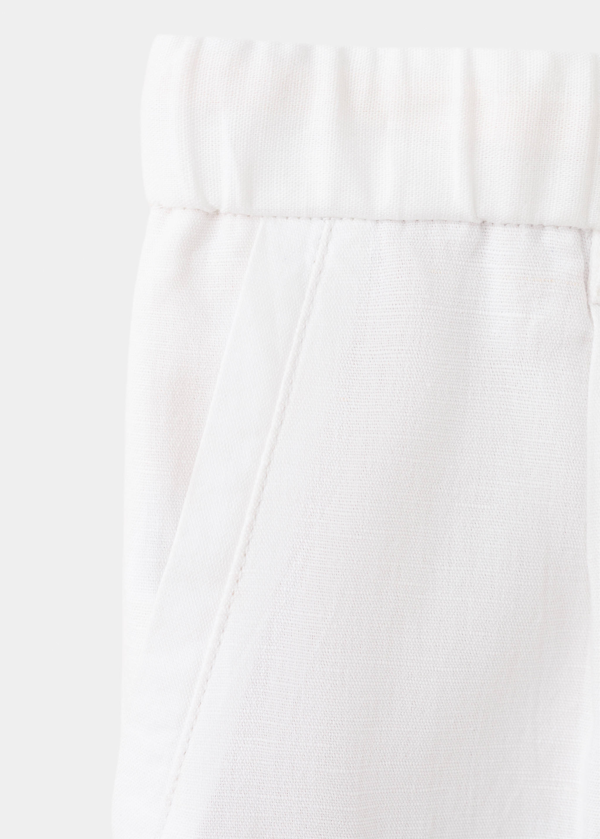 Pantalon en lin et coton coupe slim cropped - Détail de l'article 0