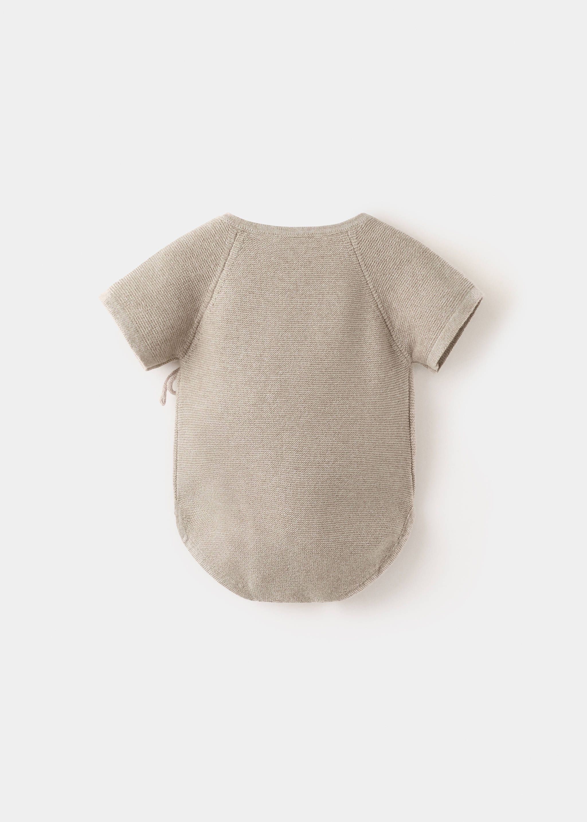 Fine knit babygrow - Reverse of the article
