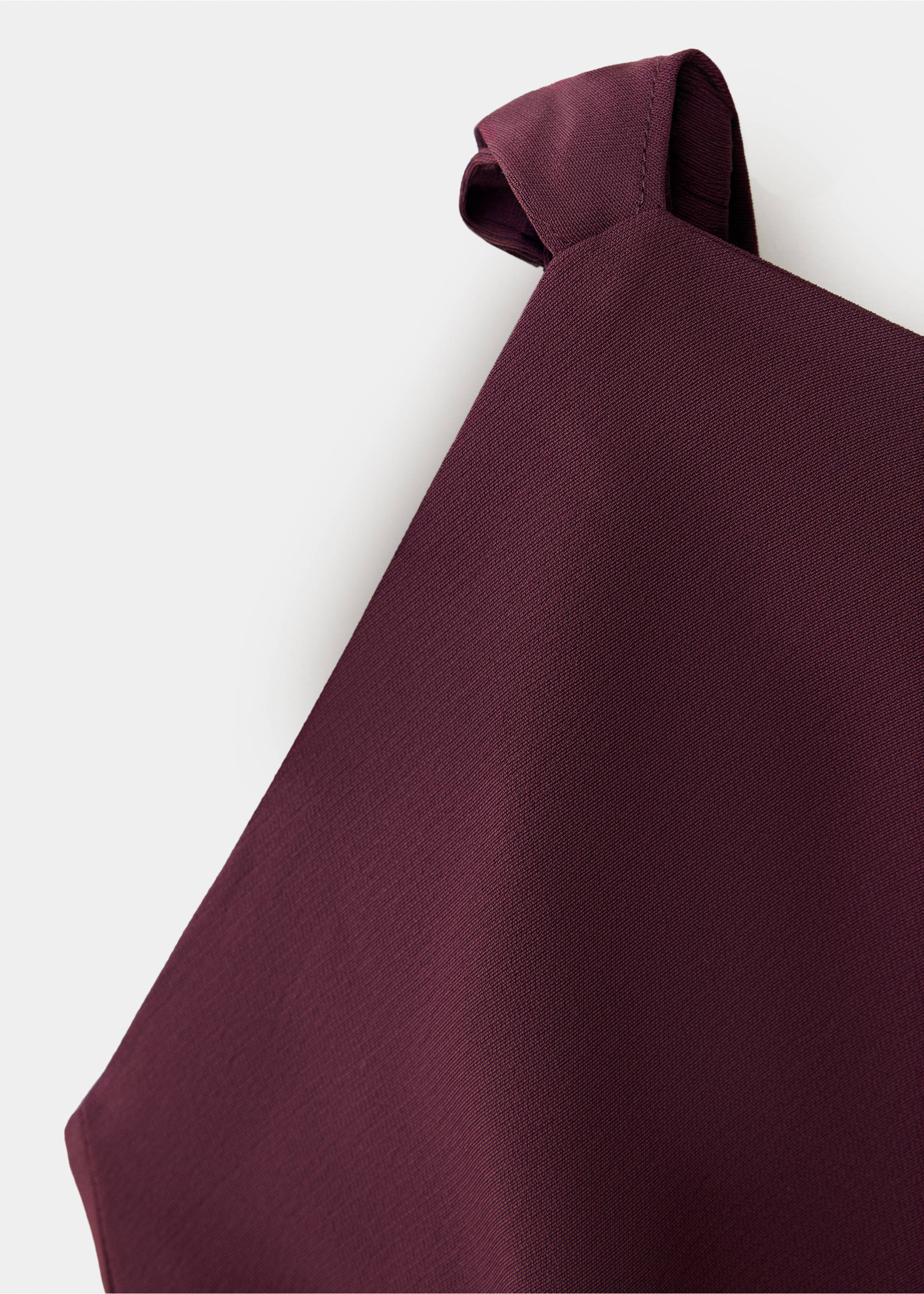 Burgundy dress fabric detail showing texture and strap., Burgundy. Ref: 37061468-00.