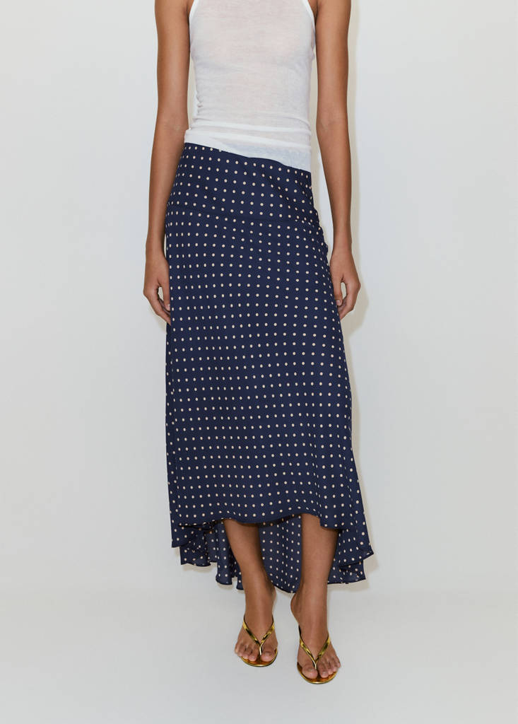 Polka-dot skirt with asymmetrical hem
