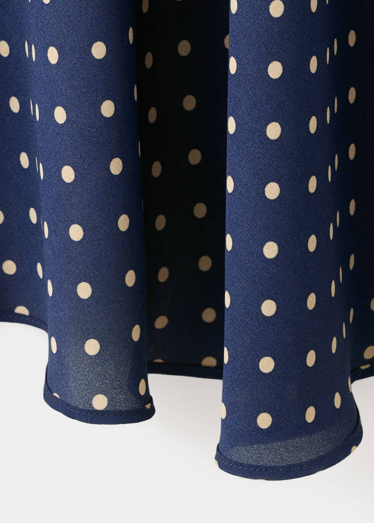 Polka dot skirt with asymmetric hem — Navy
