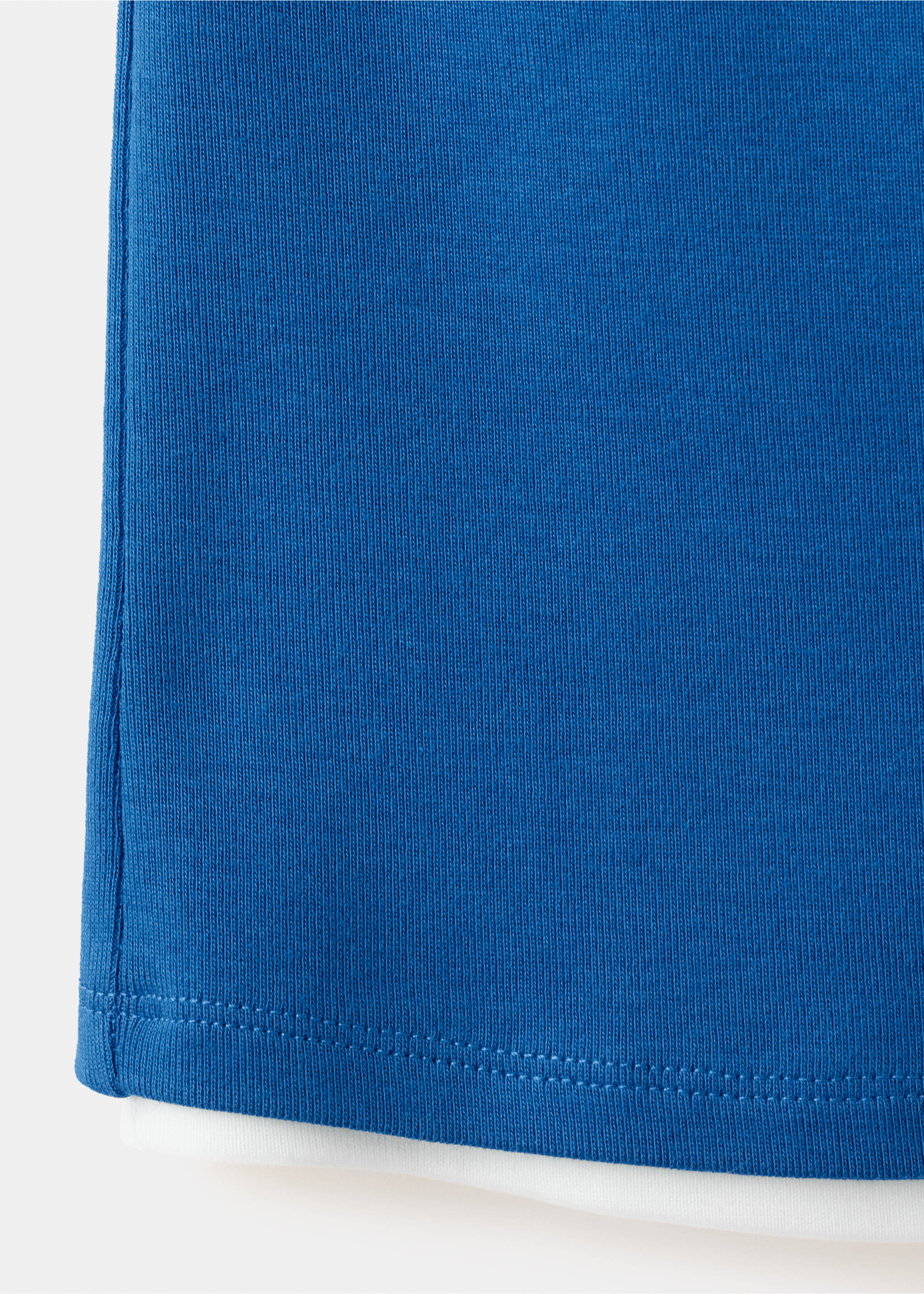 Close-up of a blue ribbed top fabric texture., Blue. Ref: 37061528-00.
