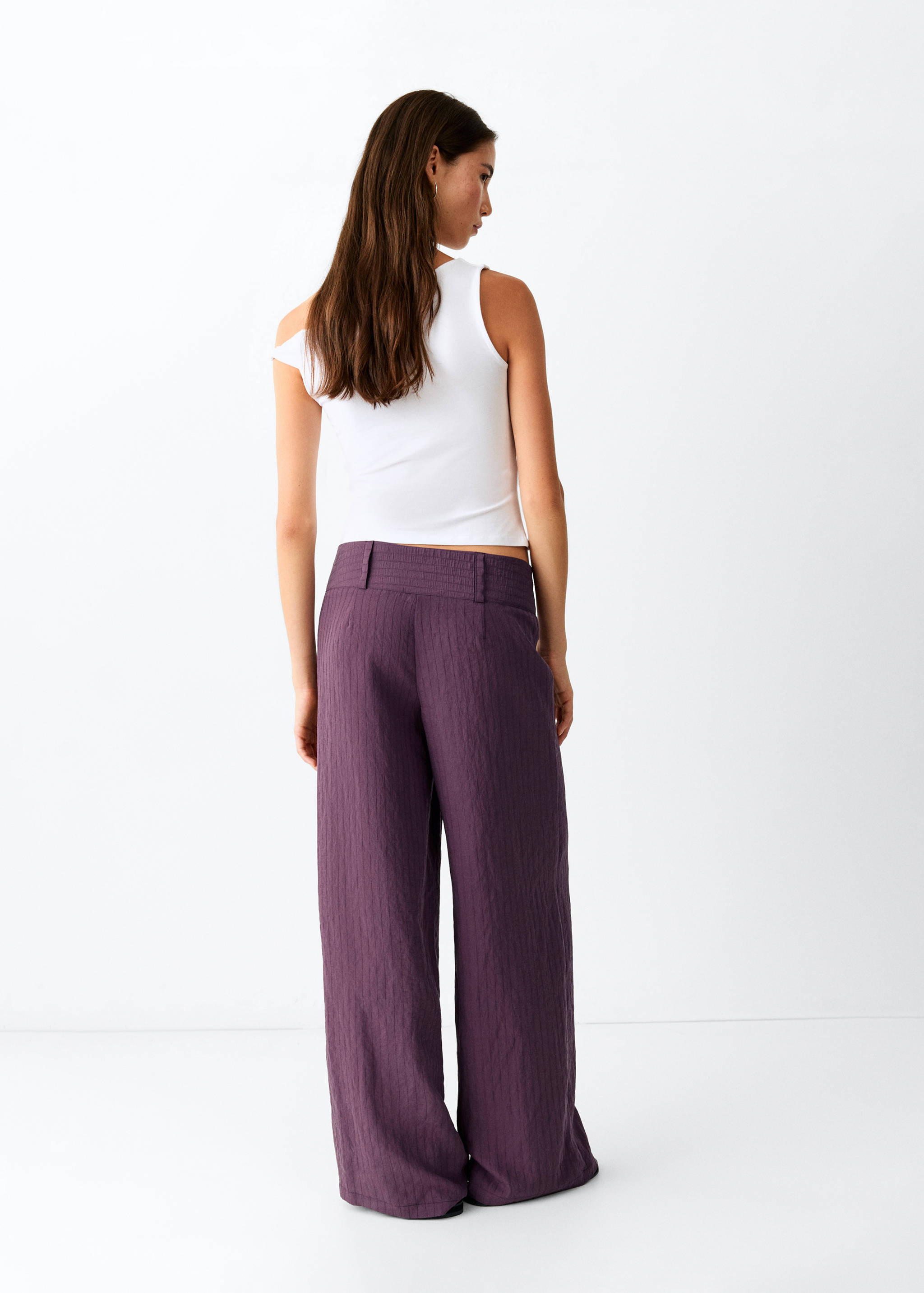 Low waist textured trousers - Reverse of the article