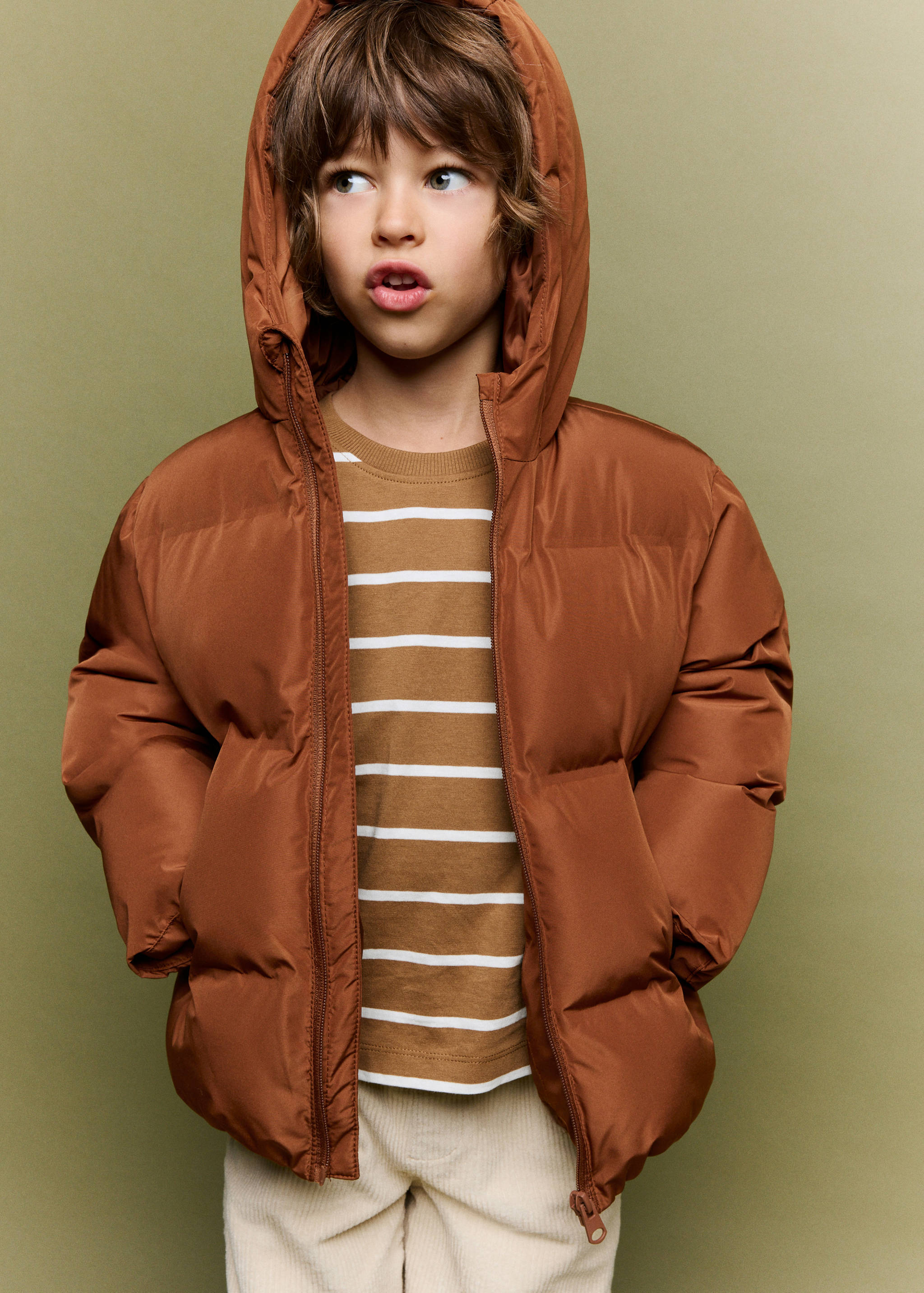 Brown hooded anorak worn by a child model.