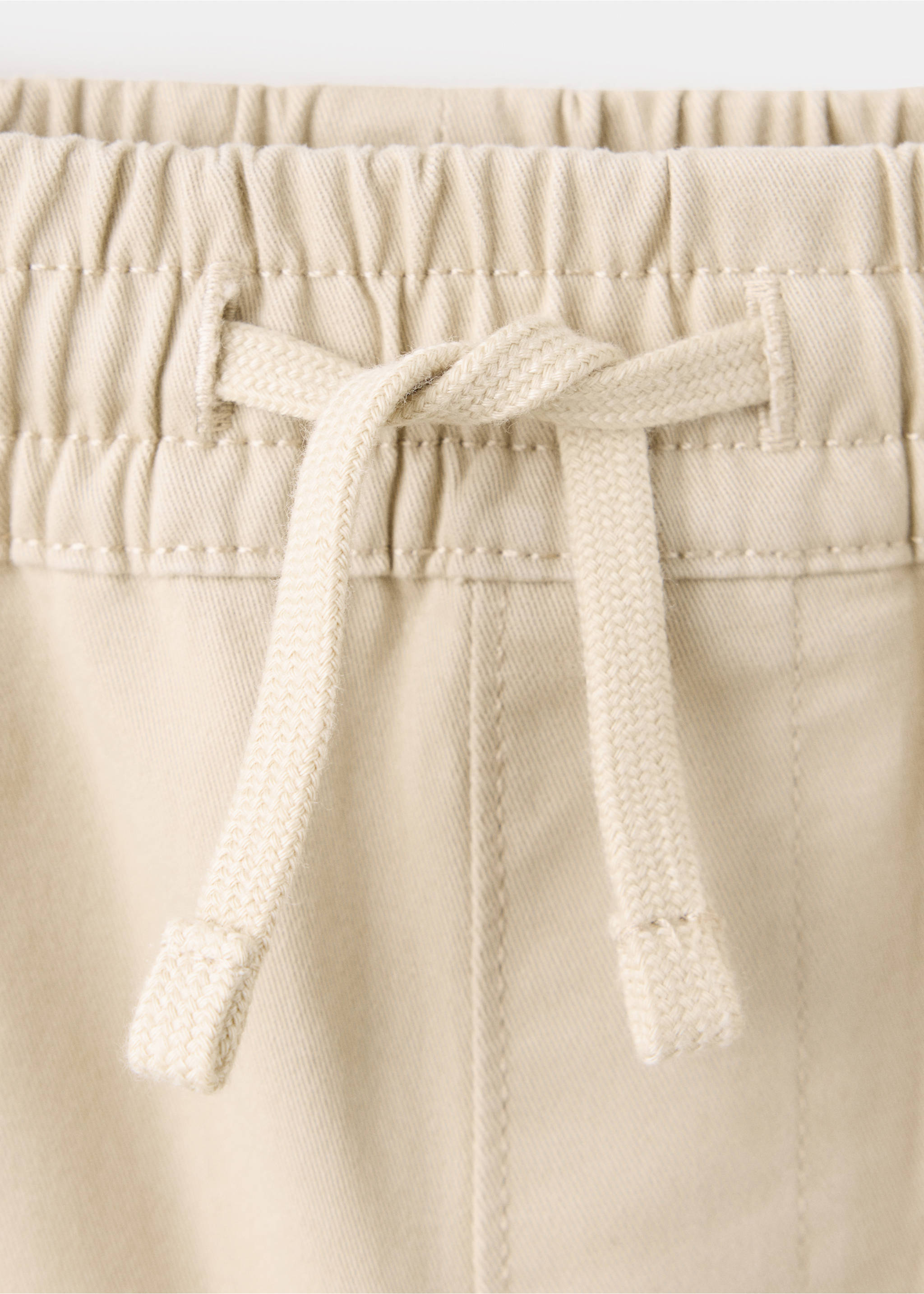 Cotton jogger-style trousers - Details of the article 8, Beige. Ref: 37063274-00.