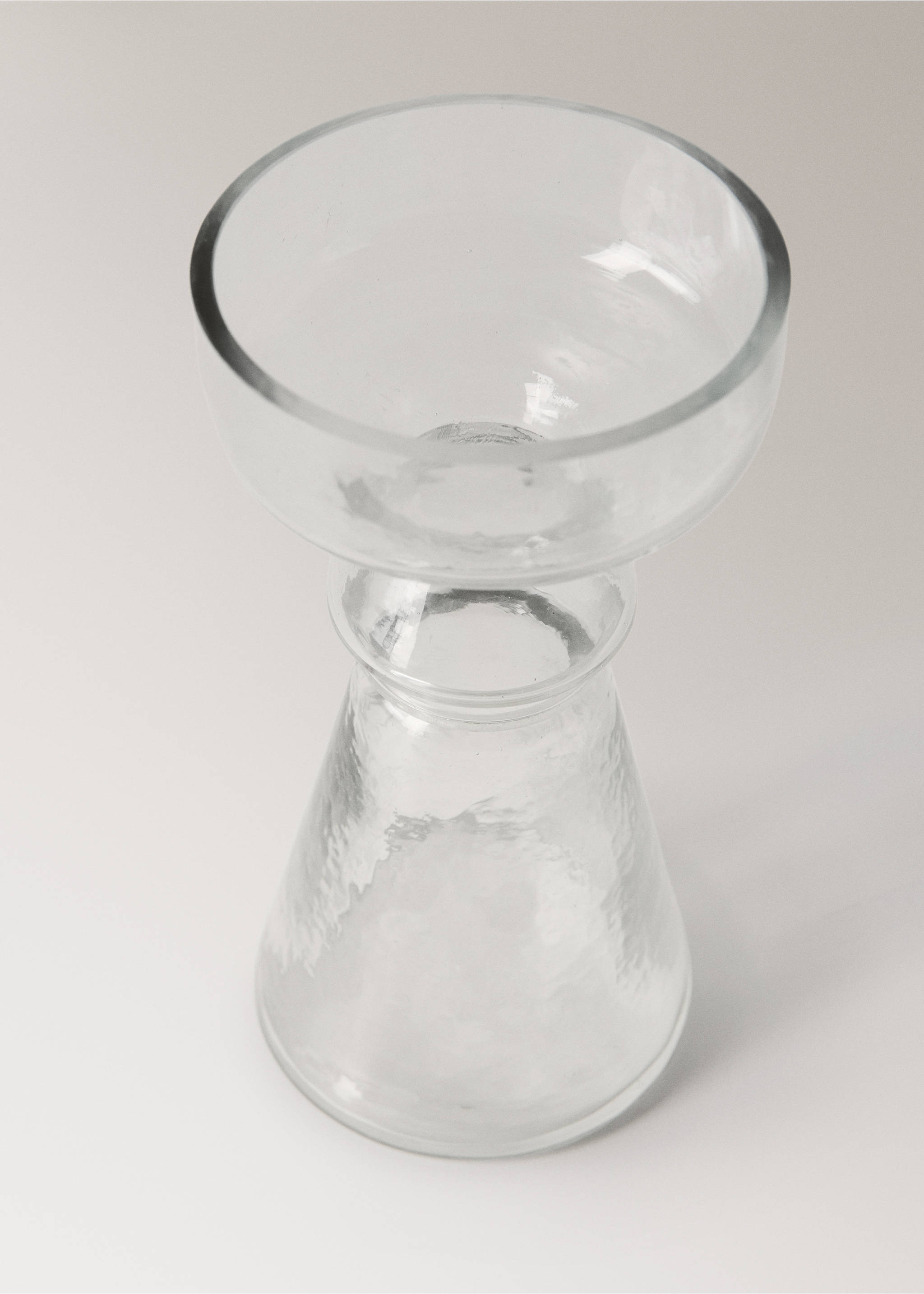 Clear glass candle holder with a textured base and wide upper bowl., Black. Ref: 37063293-00.