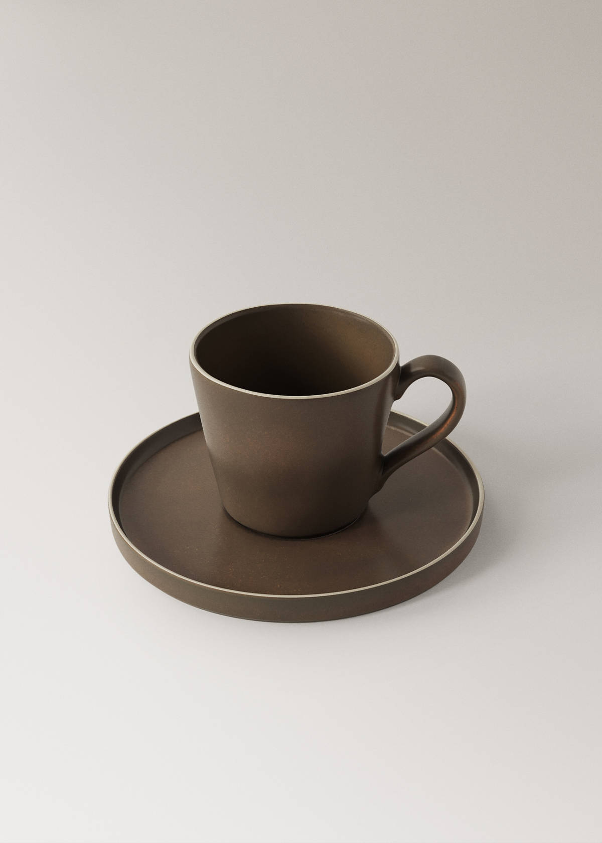 Stoneware tea cup and saucer — Chocolate
