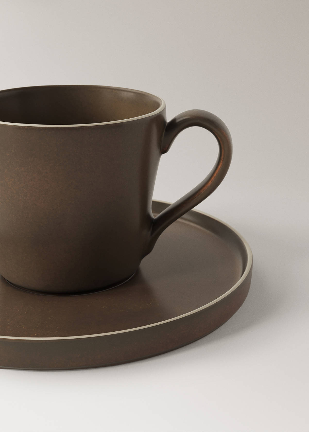 Stoneware tea cup and saucer — Chocolate