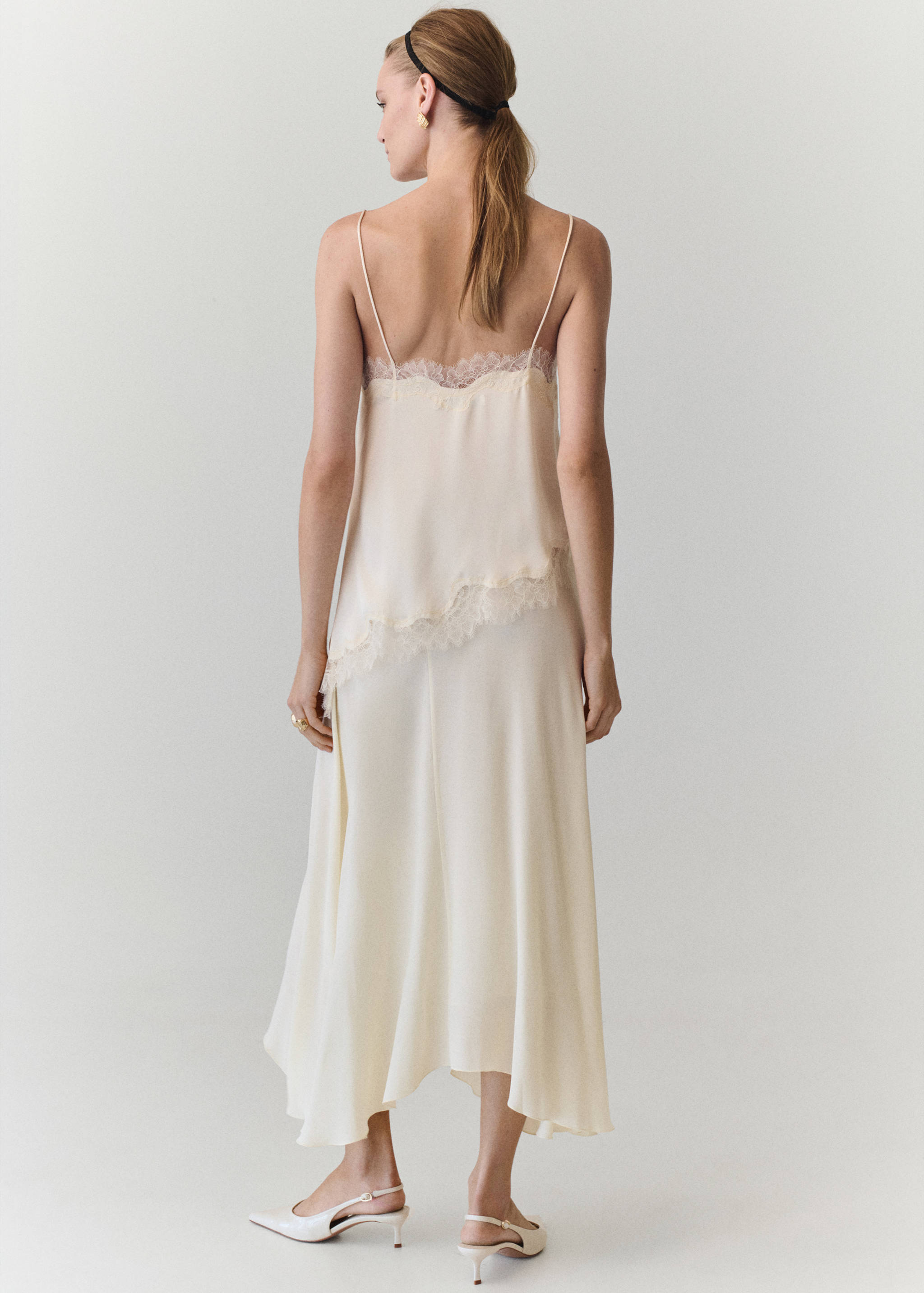 Asymmetric midi skirt - Reverse of the article