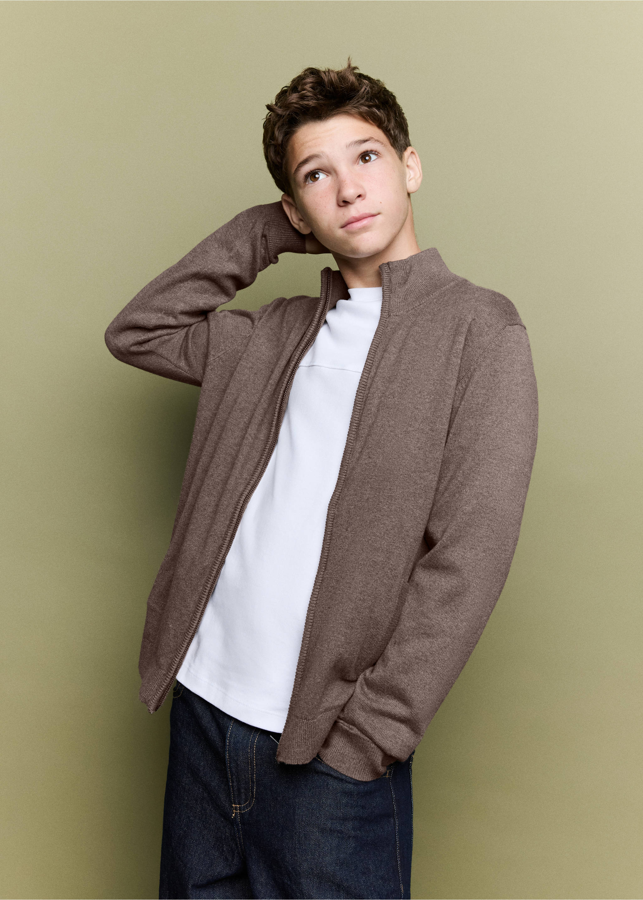 Brown zip-up knit cardigan with a high collar worn over a white t-shirt., Brown. Ref: 37064403-00.