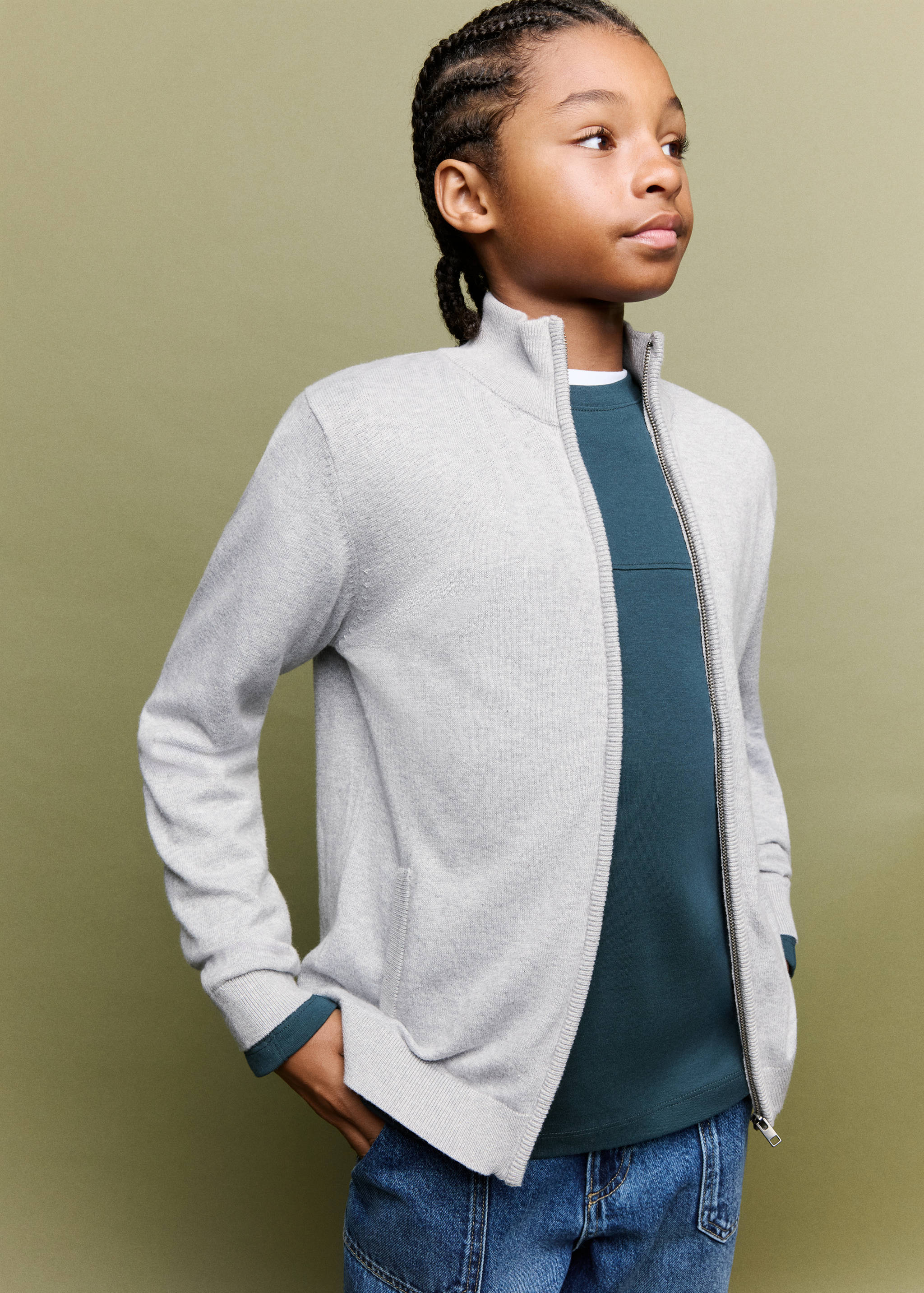 Light grey zip-up cardigan with high neck and ribbed trims.