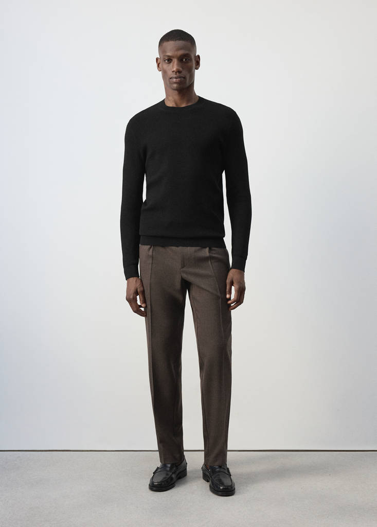 Fine-knit jersey in a cotton blend with textured structure — Black