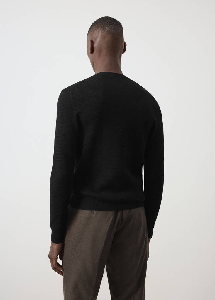 Fine-knit jersey in a cotton blend with textured structure — Black