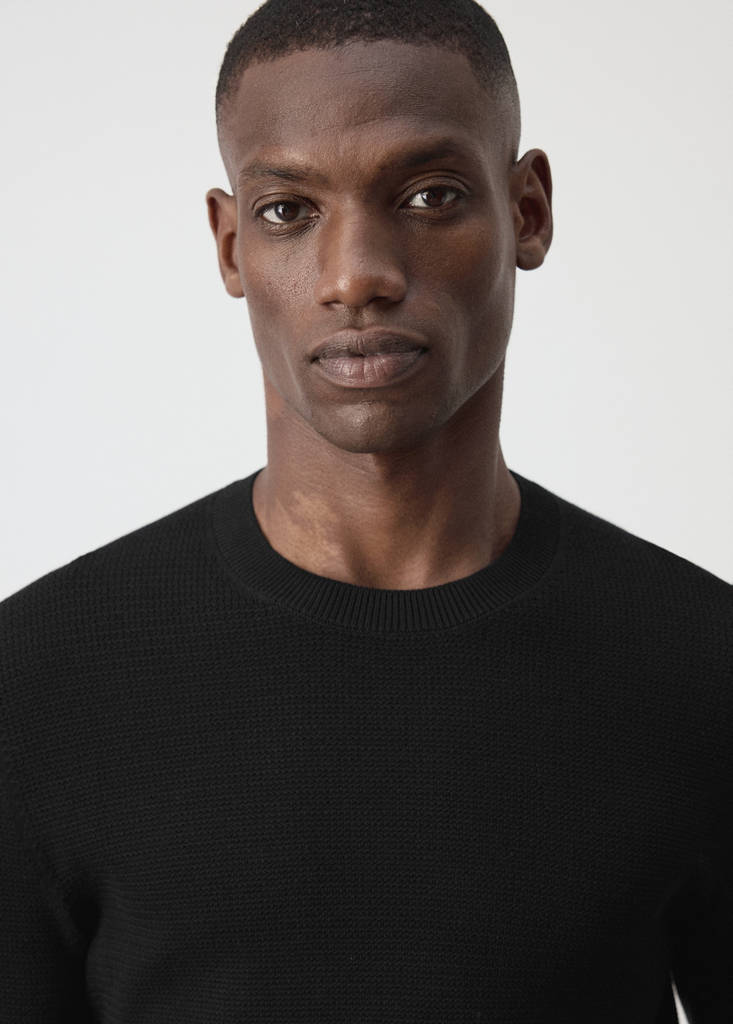 Fine-knit jersey in a cotton blend with textured structure — Black