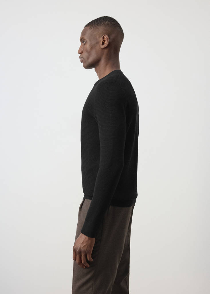 Fine-knit jersey in a cotton blend with textured structure — Black