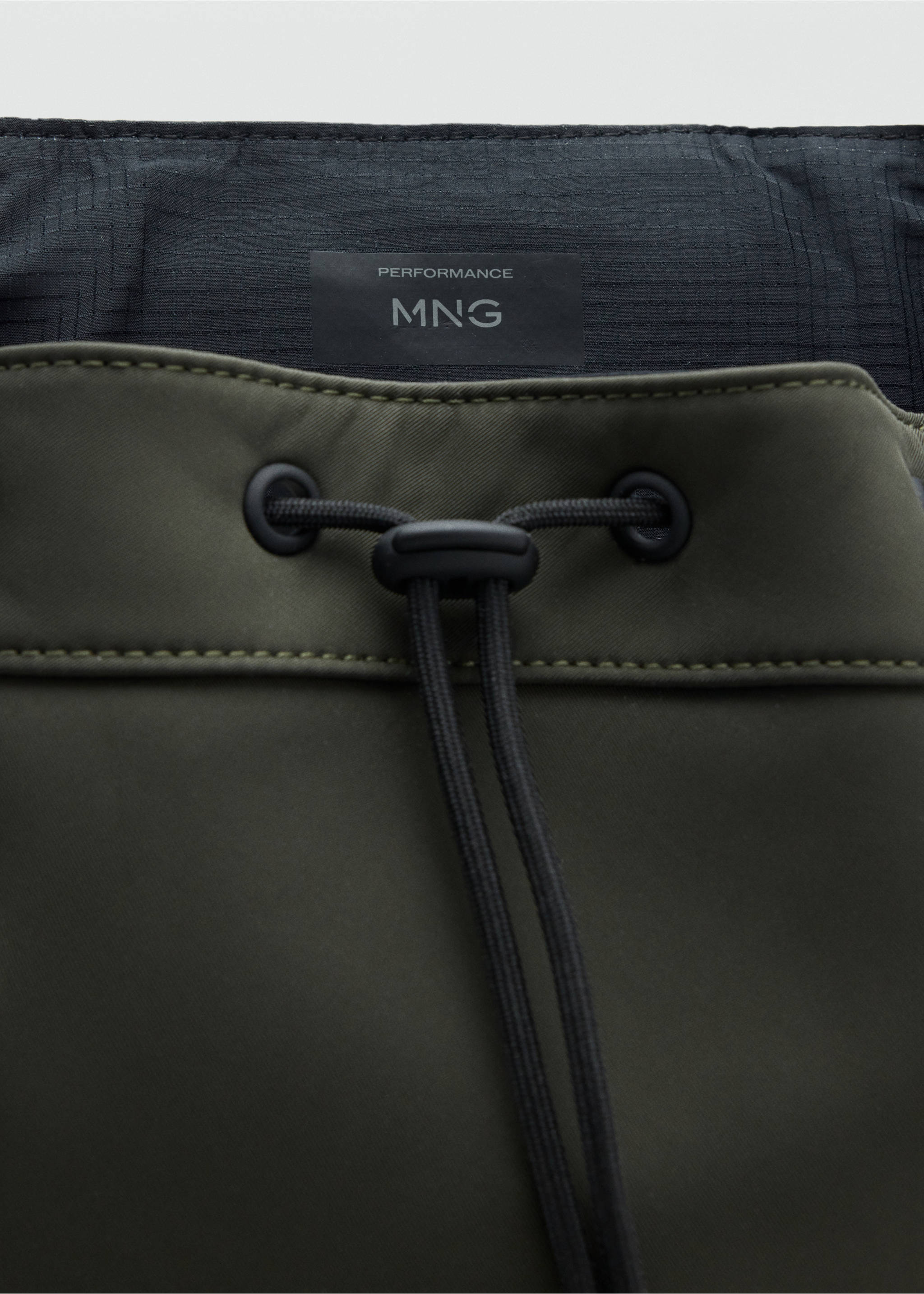 Rubberized backpack with flap closure - Details of the article 2, Khaki. Ref: 37064433-00.