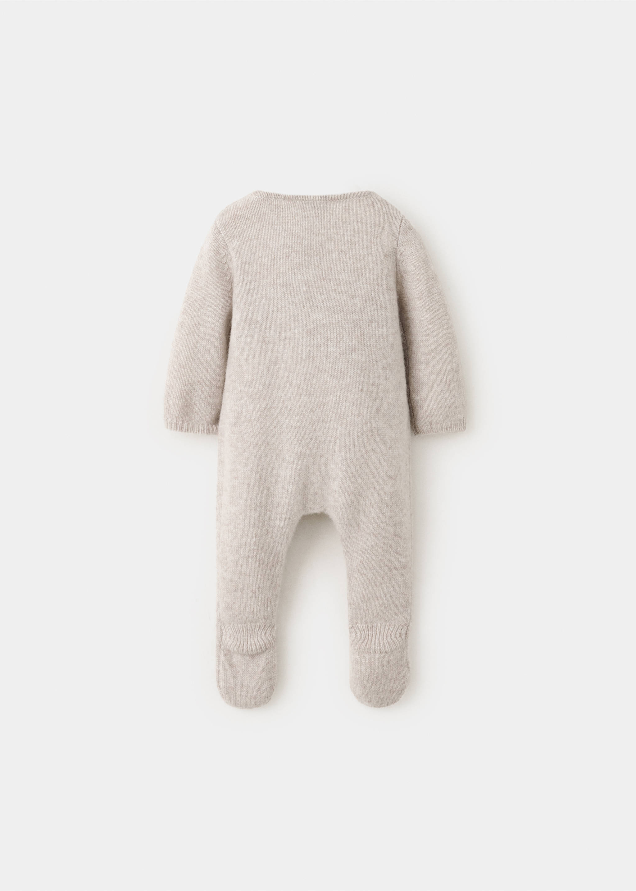 Beige knitted baby jumpsuit with long sleeves and feet, shown from the back., Sand. Ref: 37064467-00.