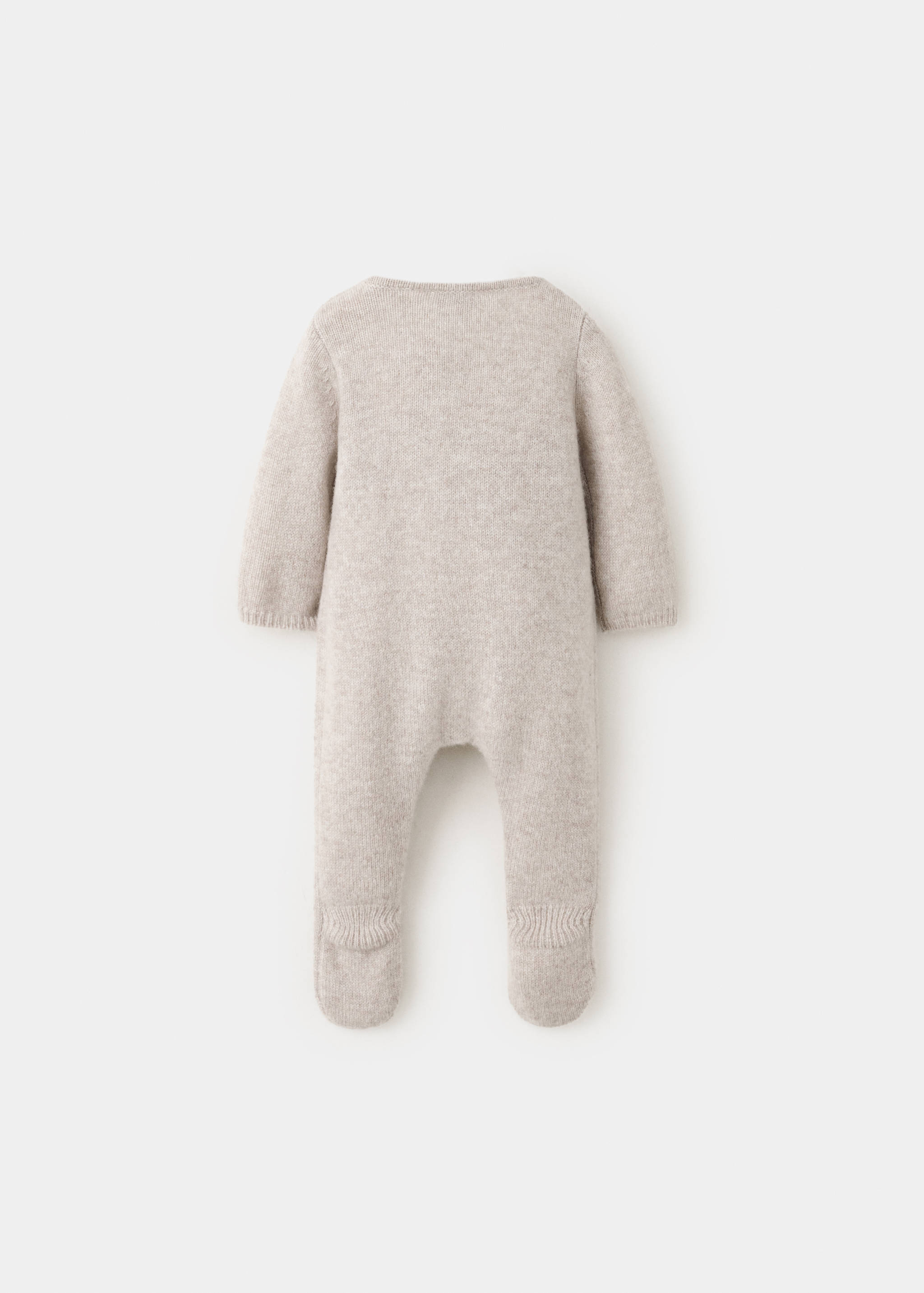 Beige knitted baby jumpsuit with long sleeves and feet, shown from the back.