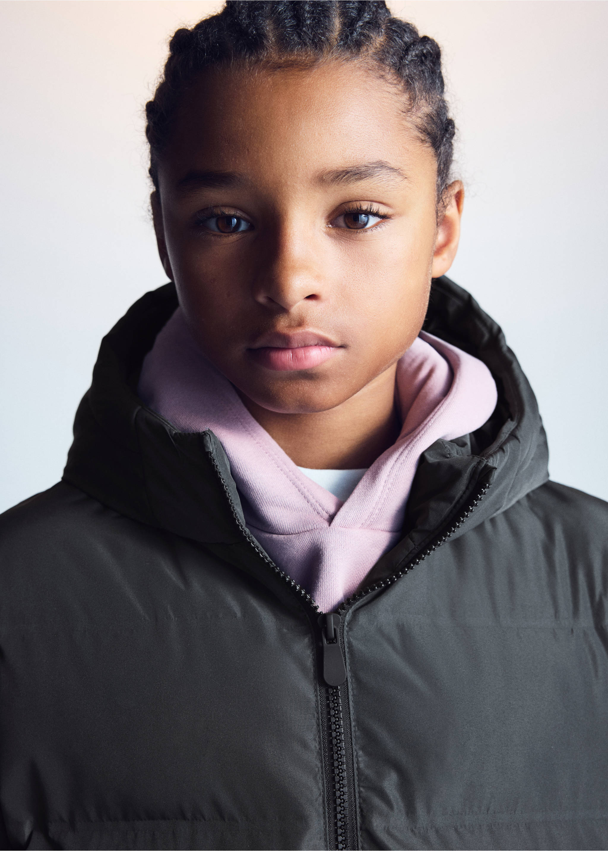 Close-up of a dark khaki green hooded anorak layered over a pink hoodie., Charcoal. Ref: 37064774-00.