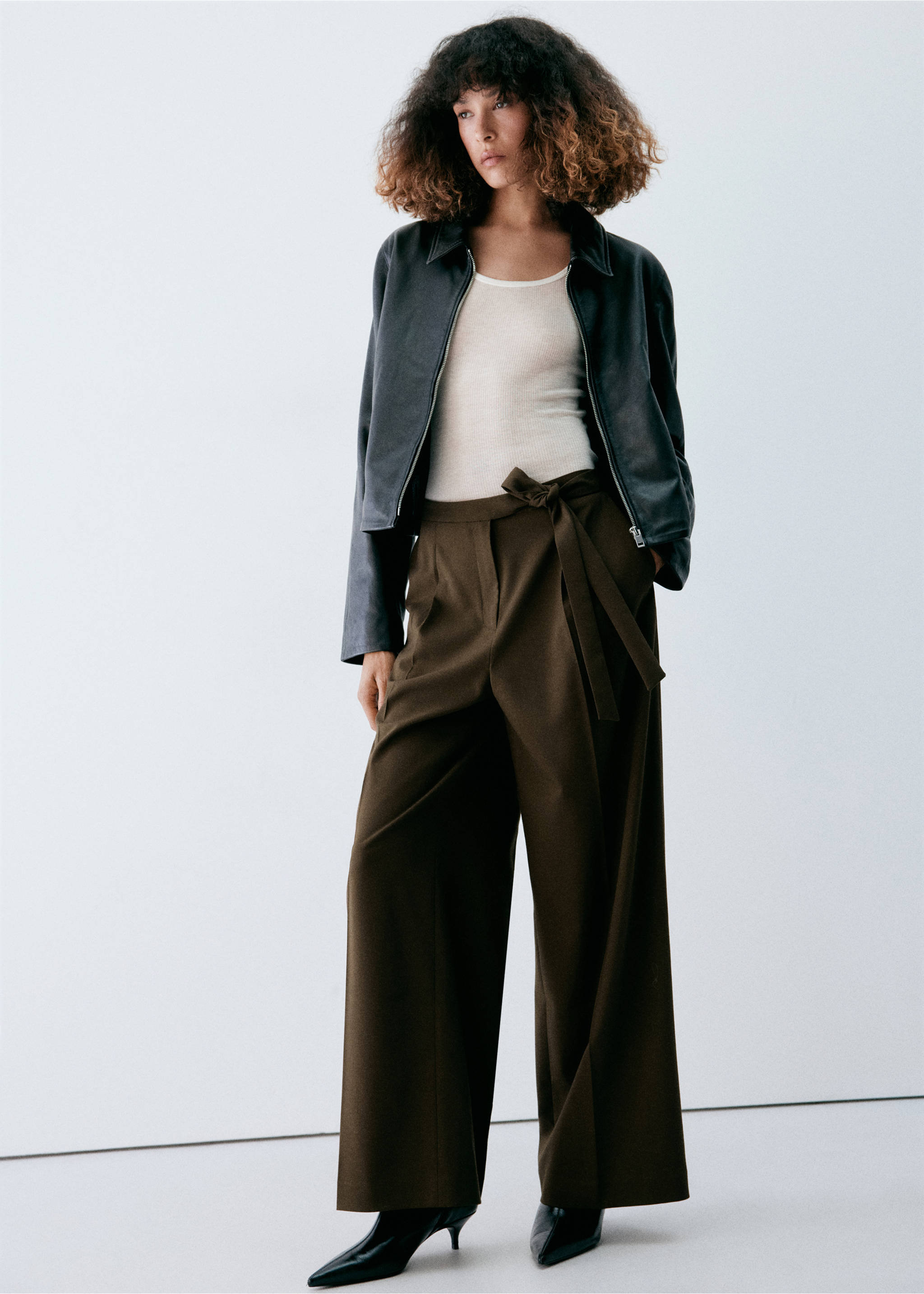Dark olive-green wide-leg trousers with a tie belt, worn with a white top and dark jacket., Brown. Ref: 37065994-00.