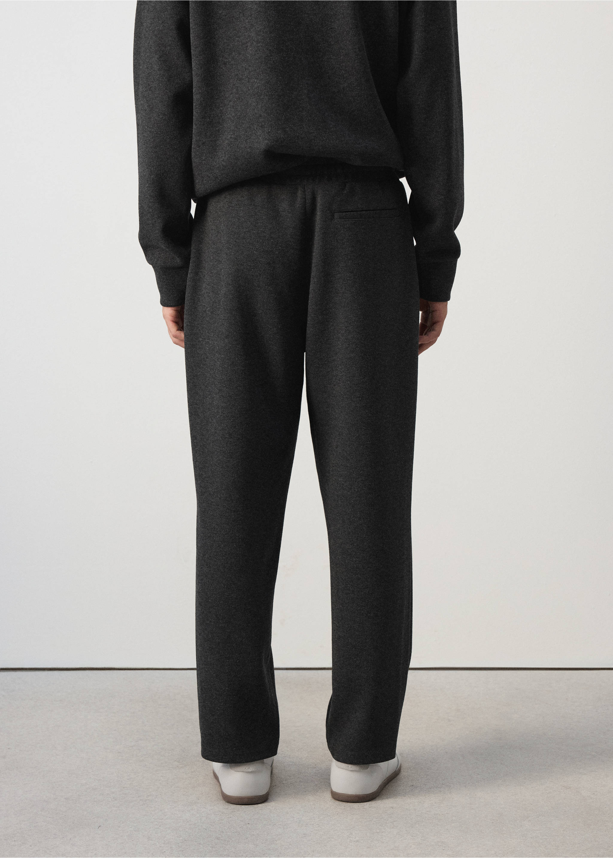 Dark grey joggers from the back, featuring an elasticated waist and a back pocket., Dark Grey. Ref: 37065996-00.