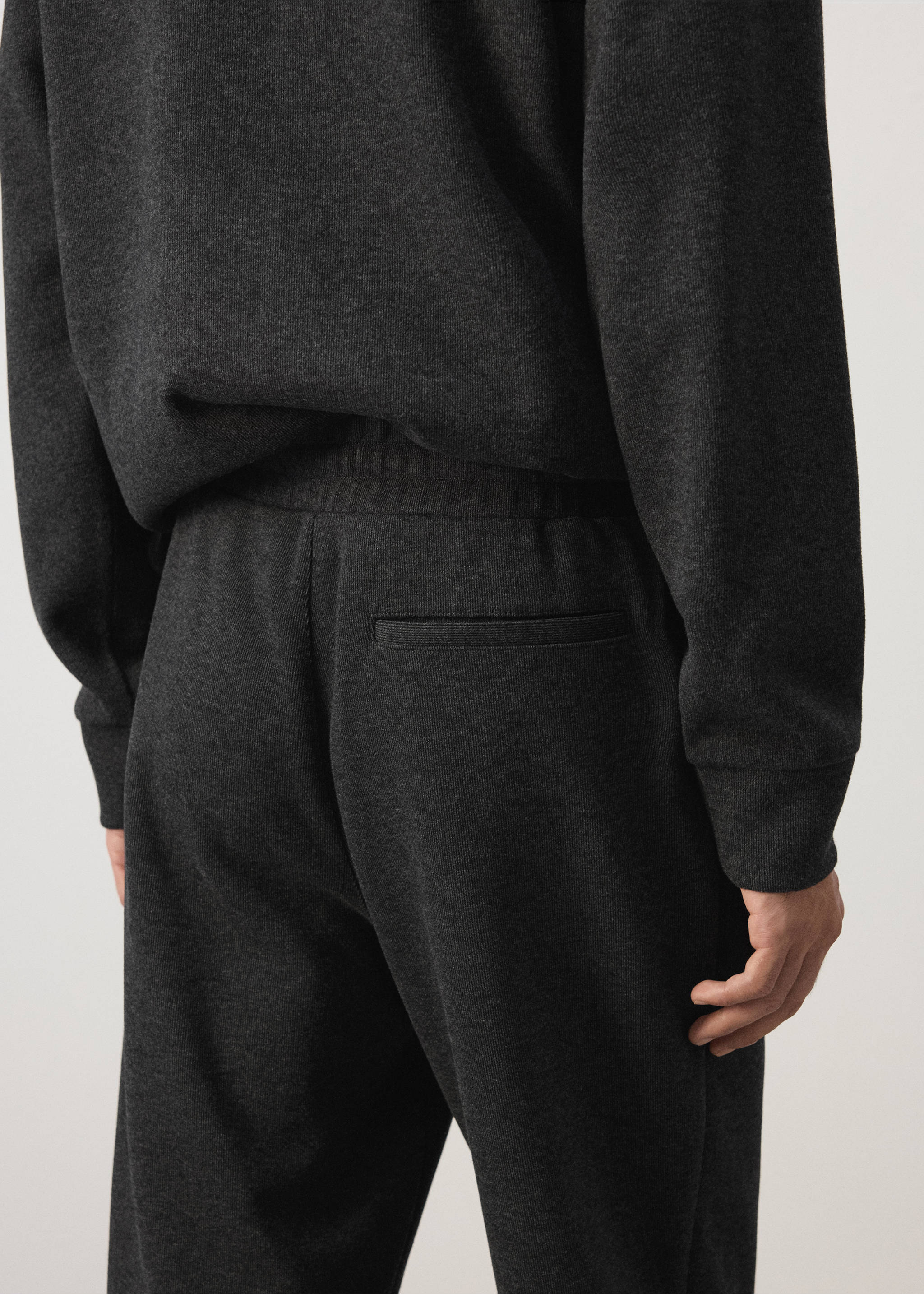 Dark grey joggers with an elasticated waist and back pocket, back view., Dark Grey. Ref: 37065996-00.