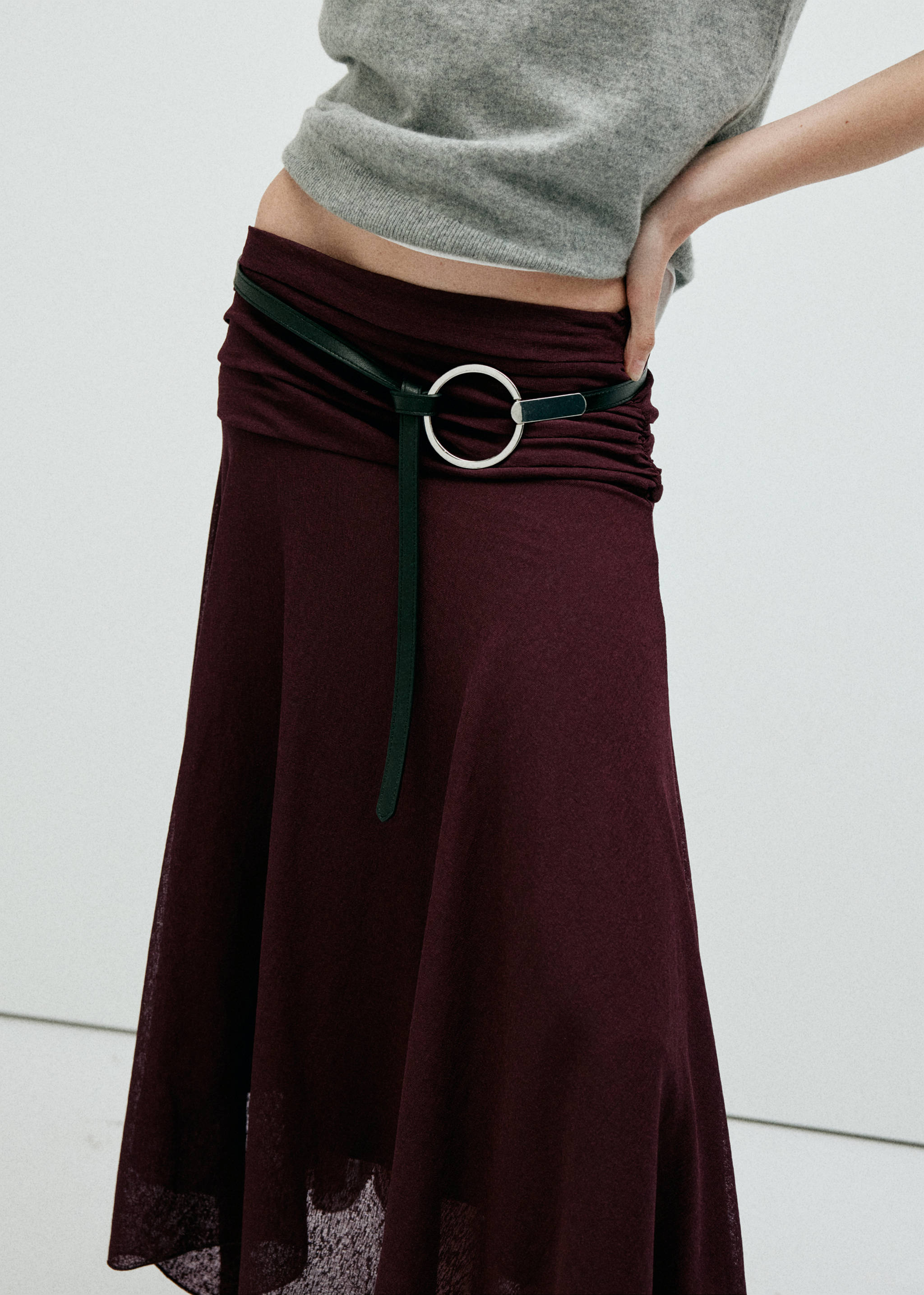 Skirt with gathers and an asymmetrical hemline - Details of the article 1, Burgundy. Ref: 37066014-00.