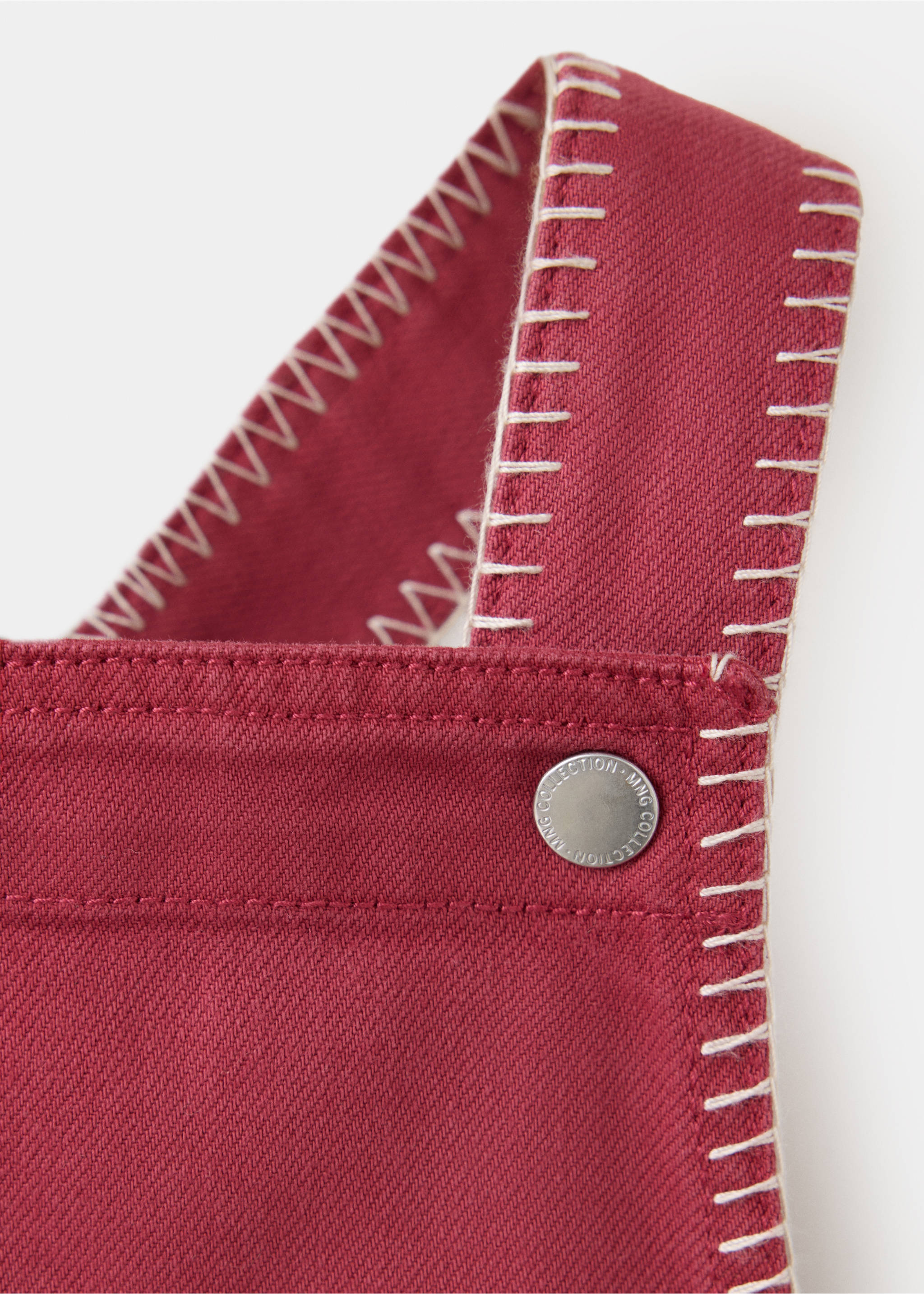 Denim pinafore dress with topstitching detail - Details of the article 8, Red. Ref: 37066344-00.