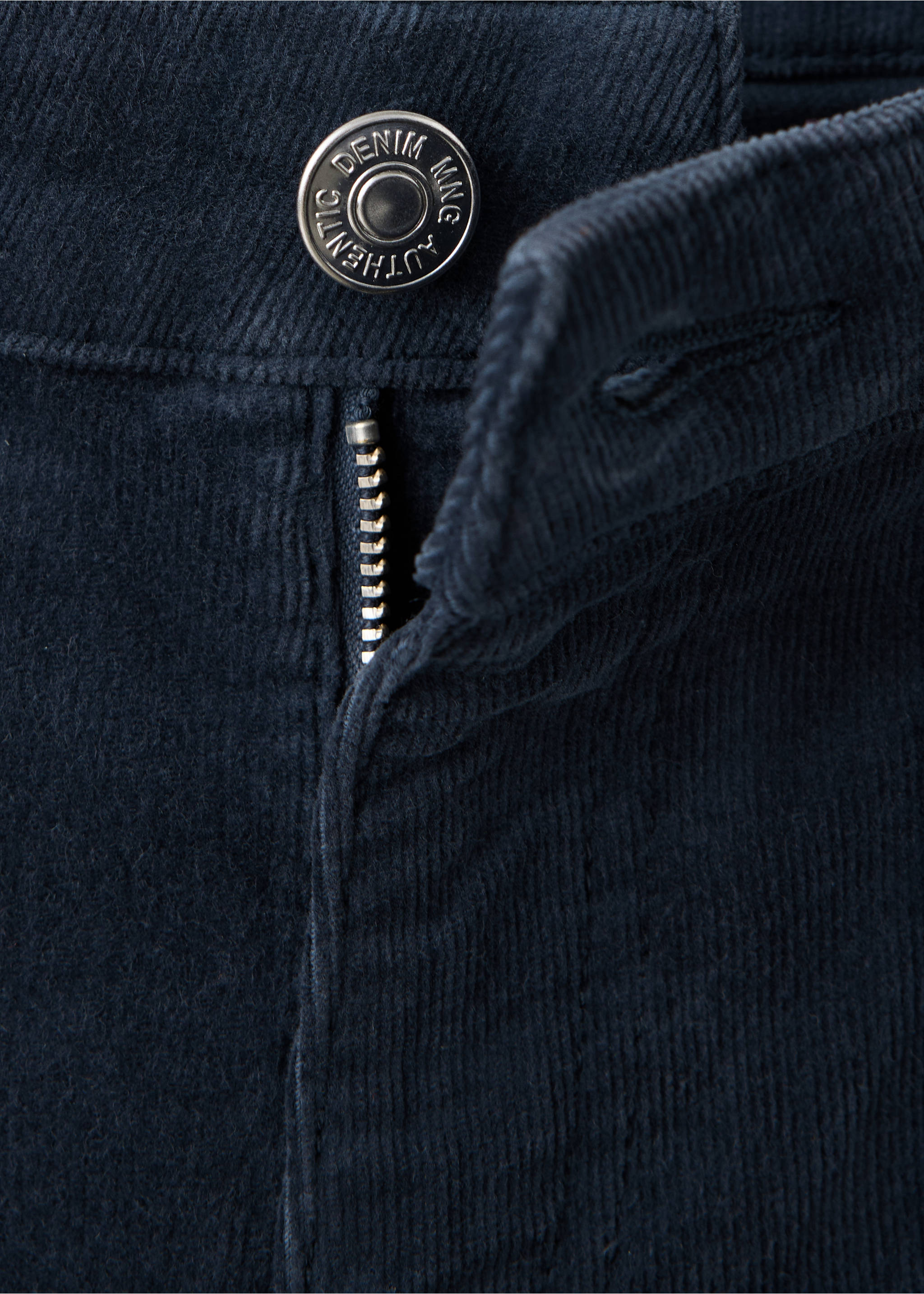 Navy blue corduroy trousers detail showing the button and zip closure., Navy. Ref: 37066724-00.