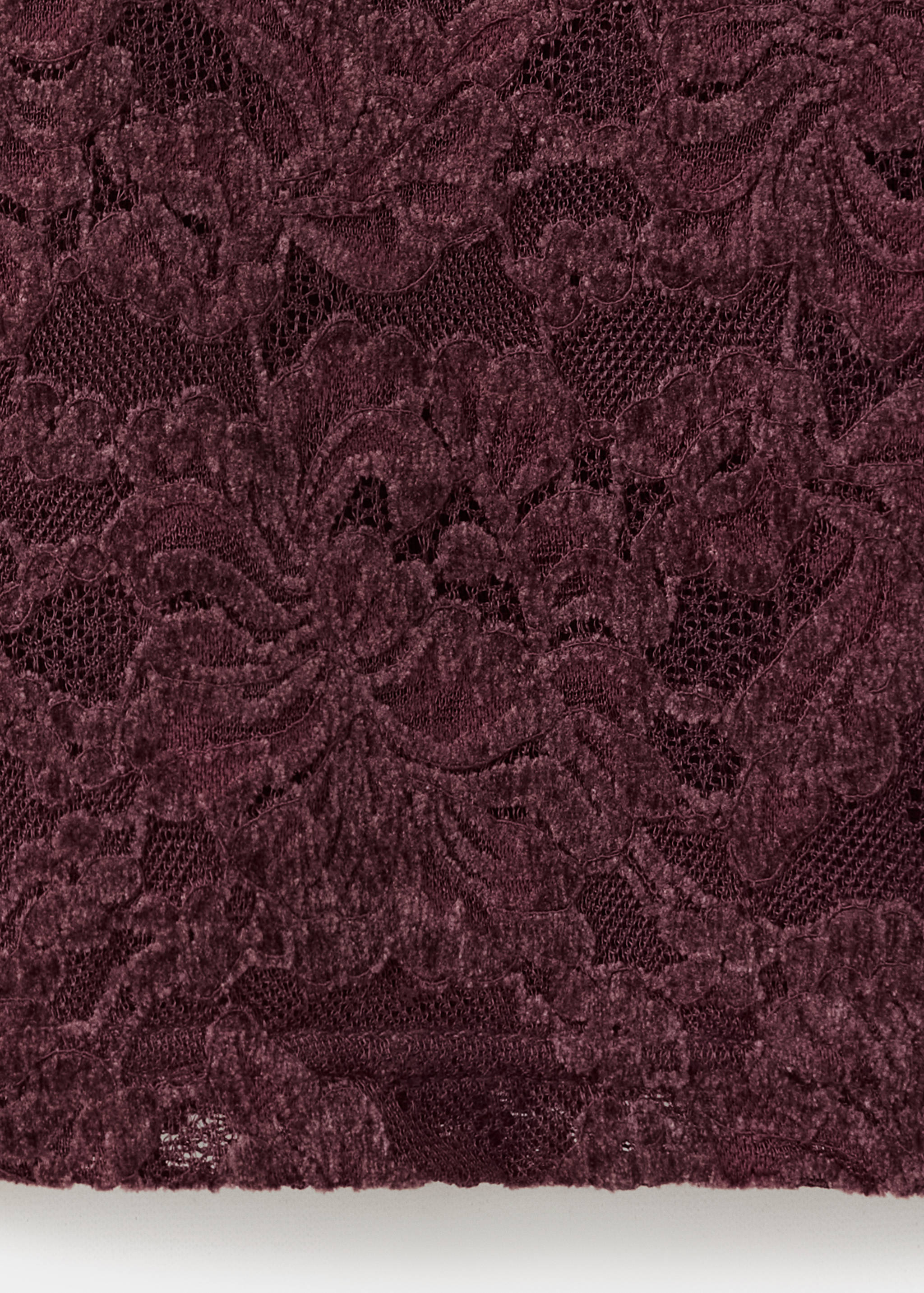 Burgundy lace top fabric texture close-up