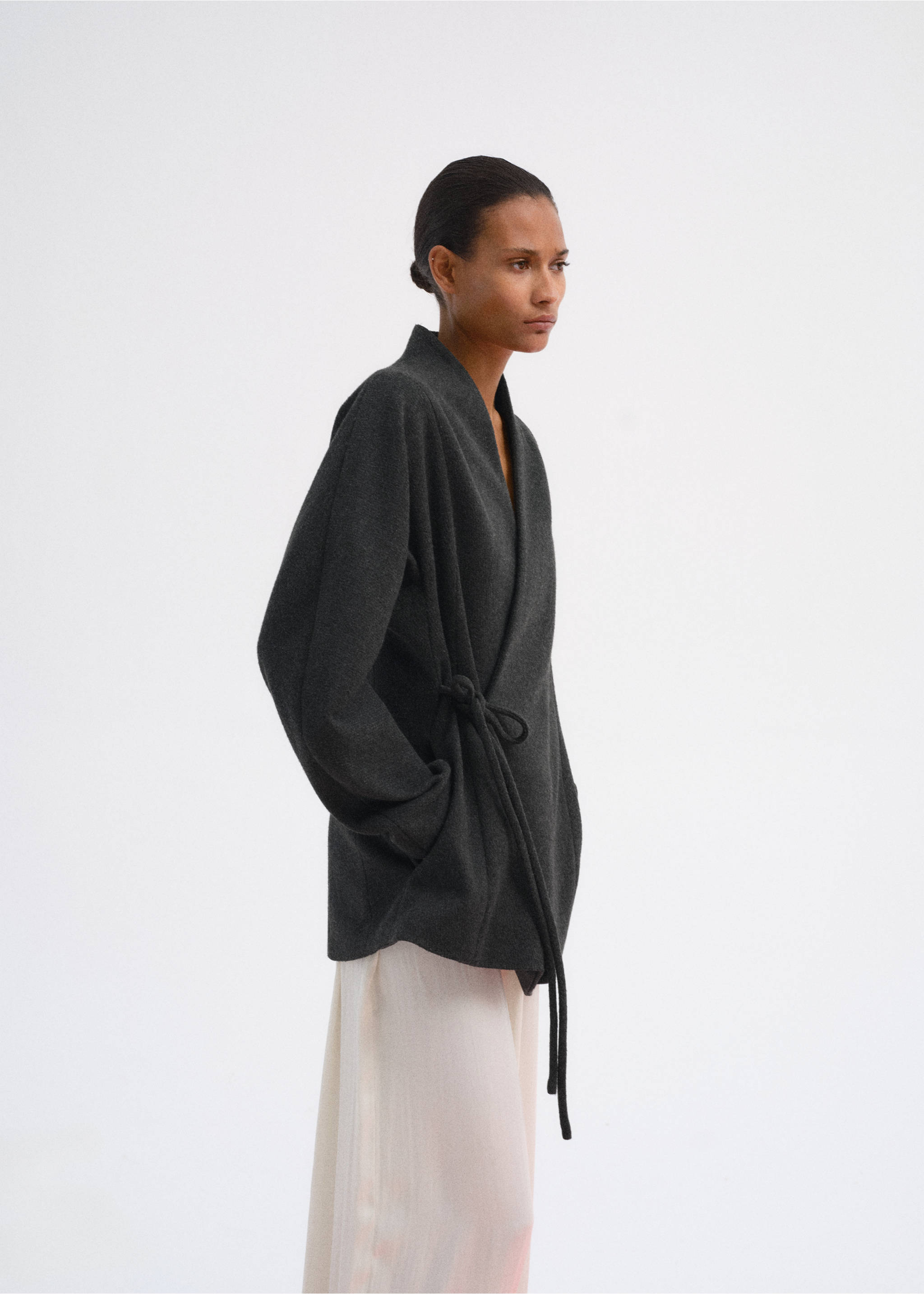 Dark grey wrap coat with a side tie closure and long sleeves., Charcoal. Ref: 37067782-00.