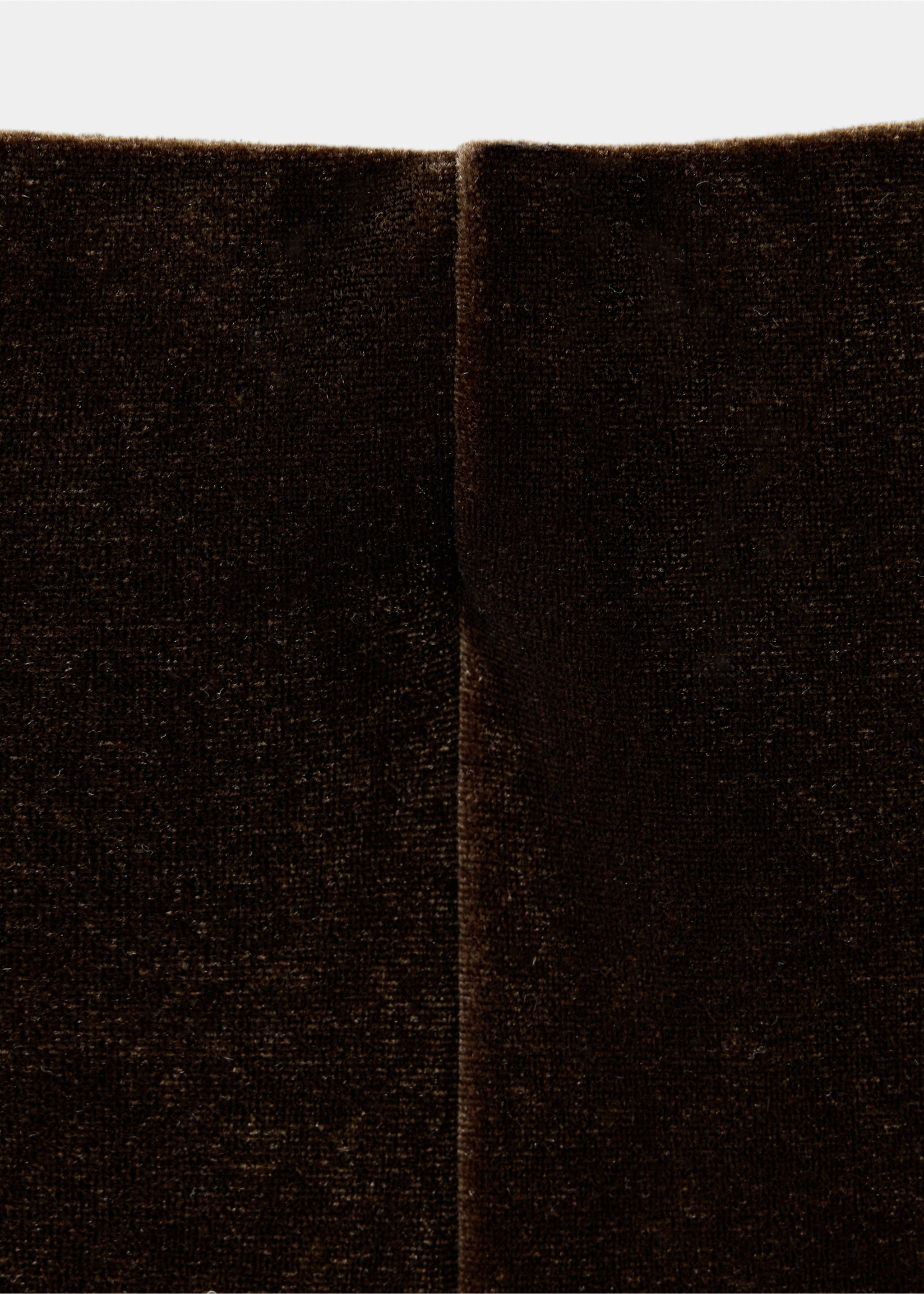 Close-up of dark brown velvet trousers fabric and seam., Dark Green. Ref: 37067795-00.