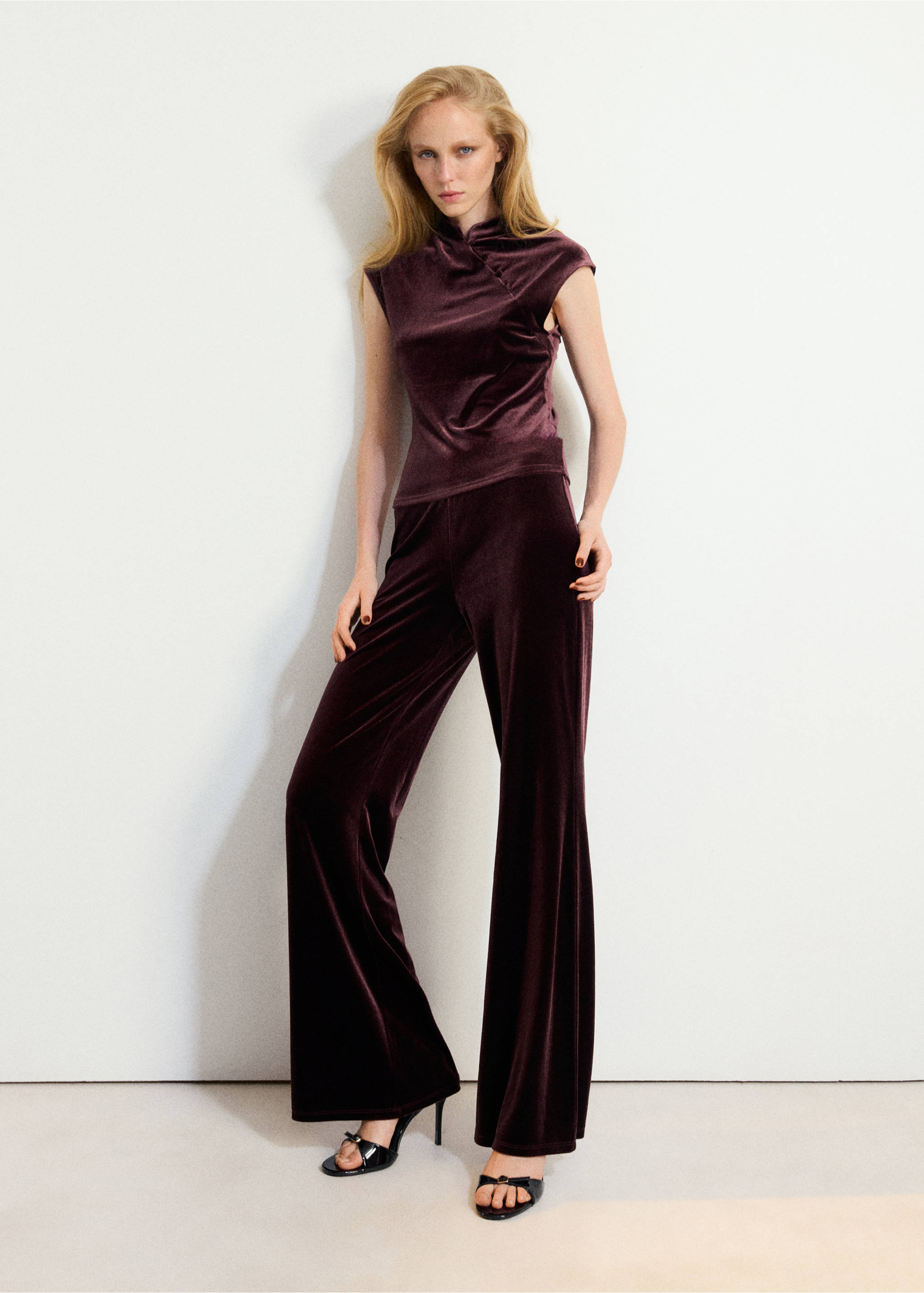 Dark plum velvet wide-leg trousers worn with a matching top, Wine. Ref: 37067795-00.