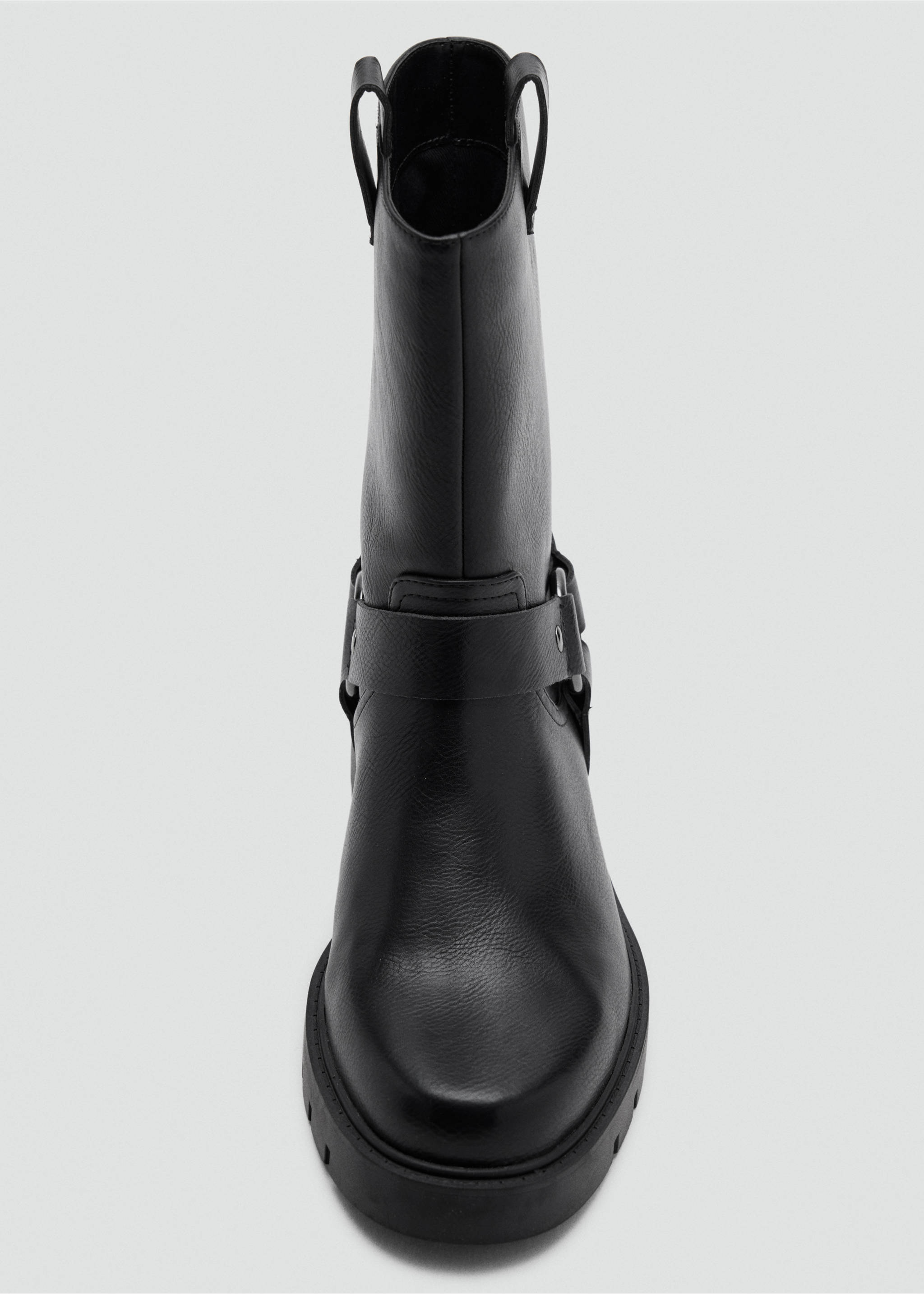 Black boot featuring an ankle harness and lug sole., Black. Ref: 37067797-00.