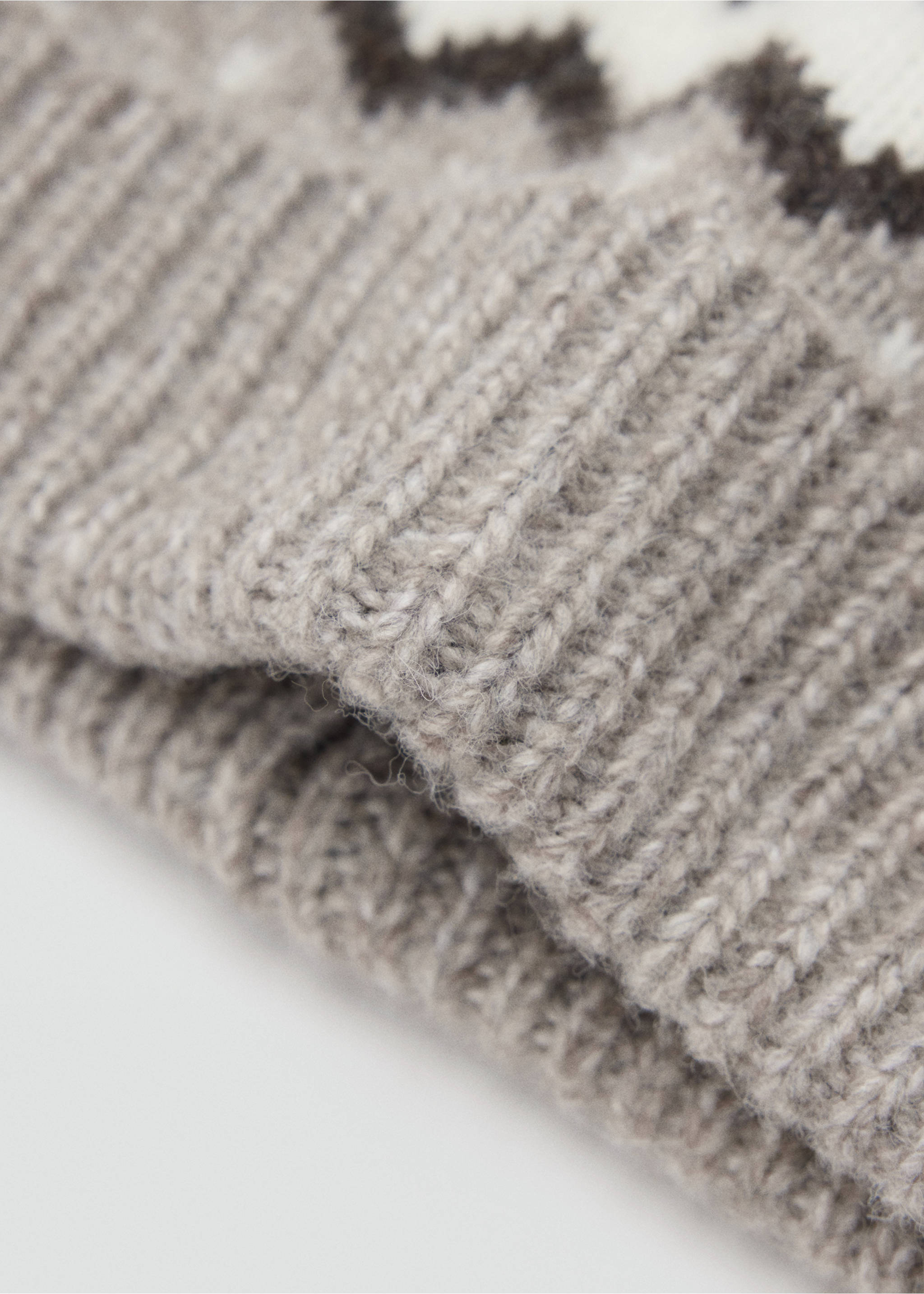 Grey knit hat detail showing the ribbed brim and fair isle pattern., Beige. Ref: 37067799-00.