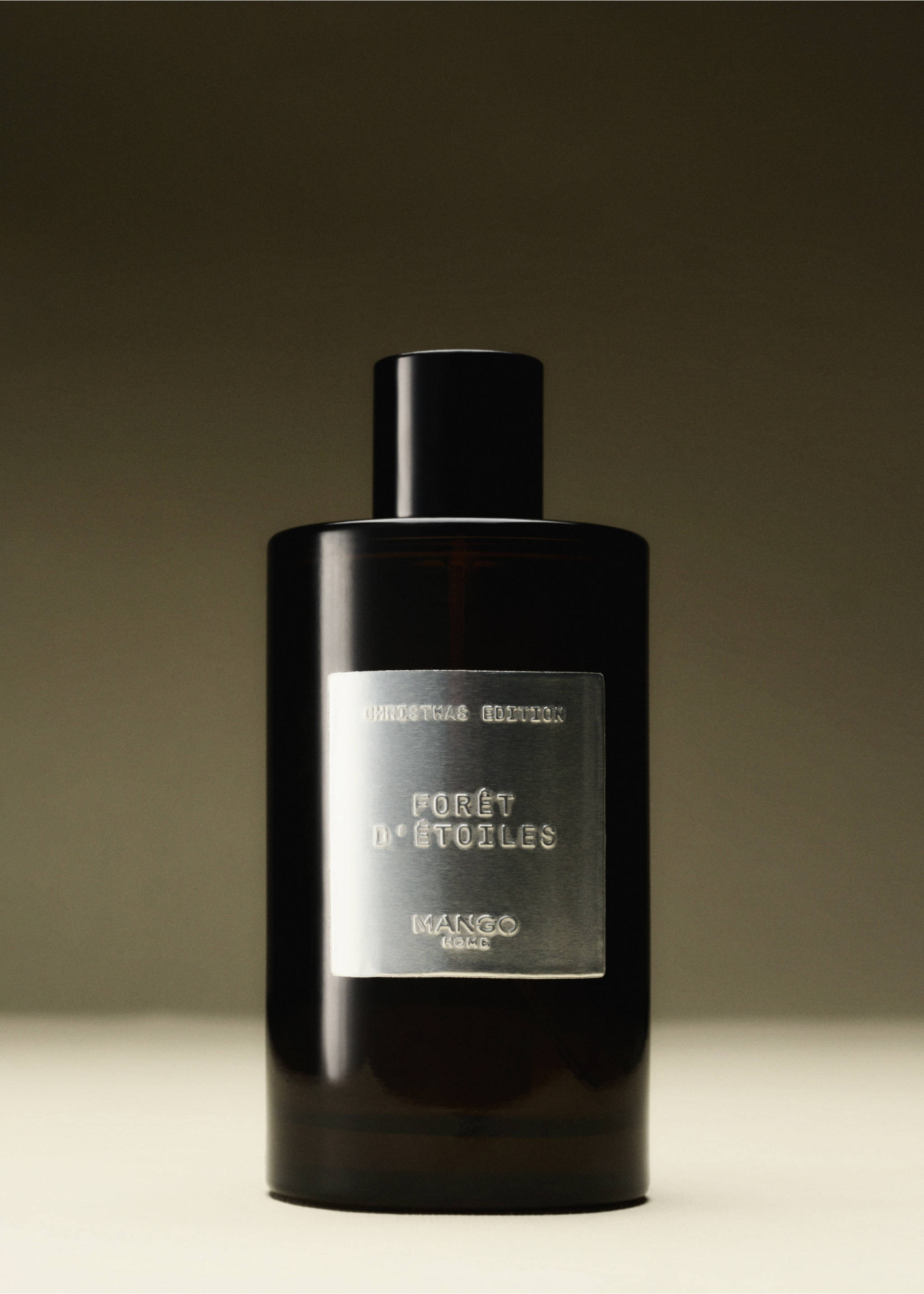 Dark brown glass home spray bottle with a silver label., Silver. Ref: 37067811-00.